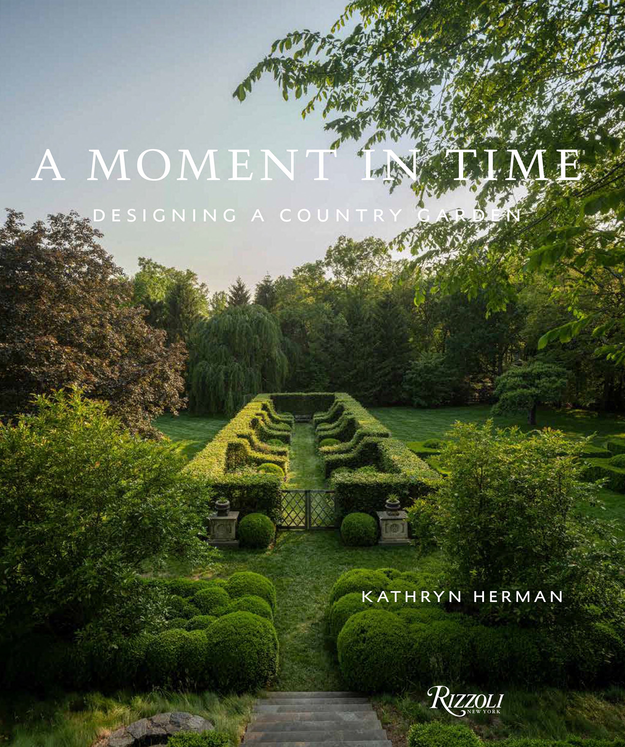 A Moment in Time book cover: garden with low decorative hedge