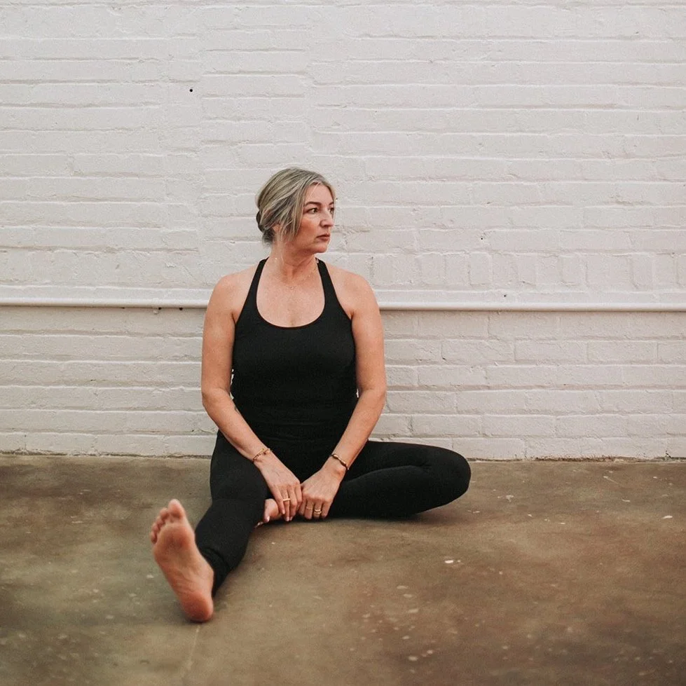 beth cosi at dwell studio in seated pose