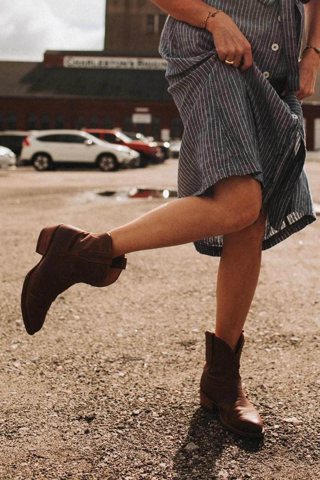 girl in boots and dress