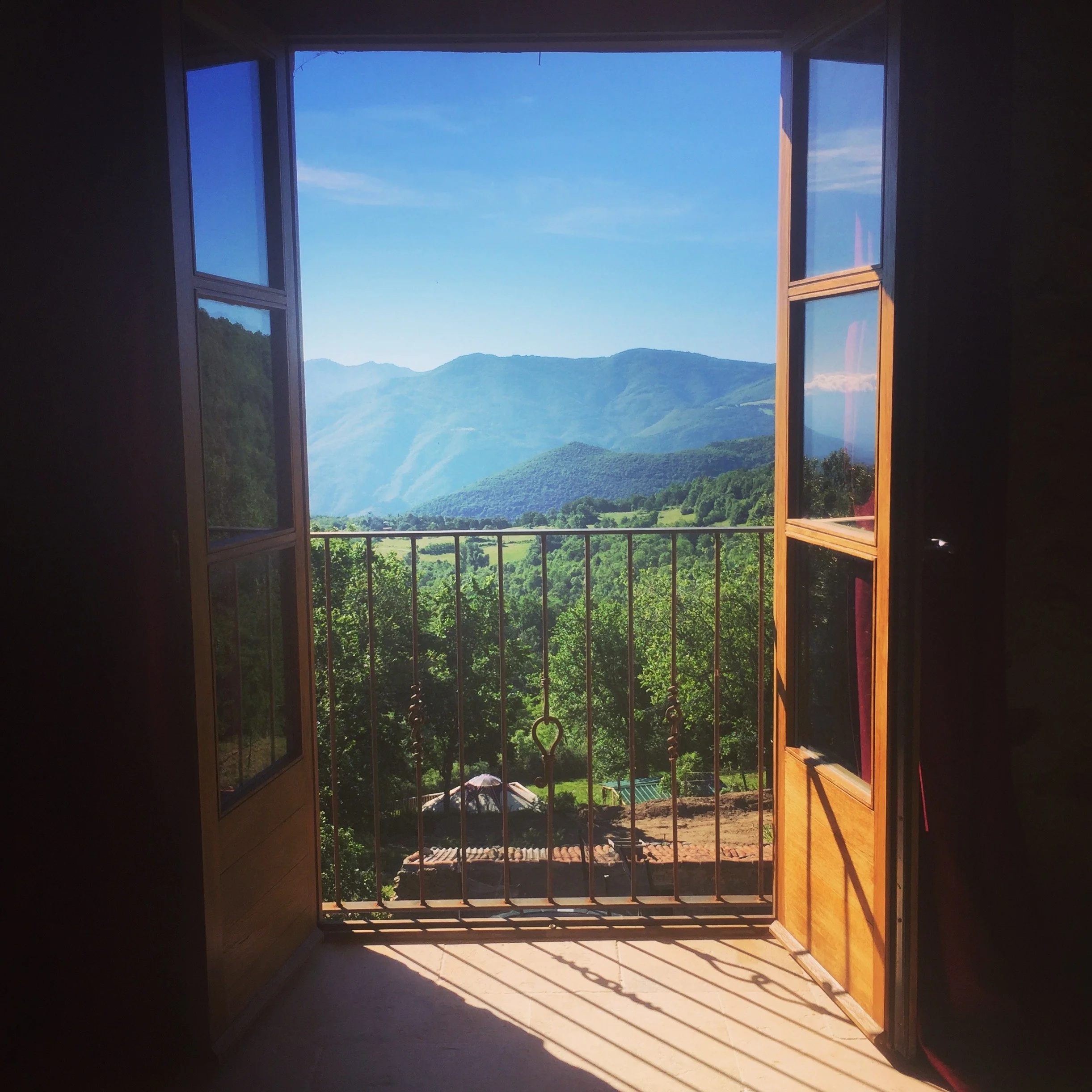 french doors opening to pyrenees