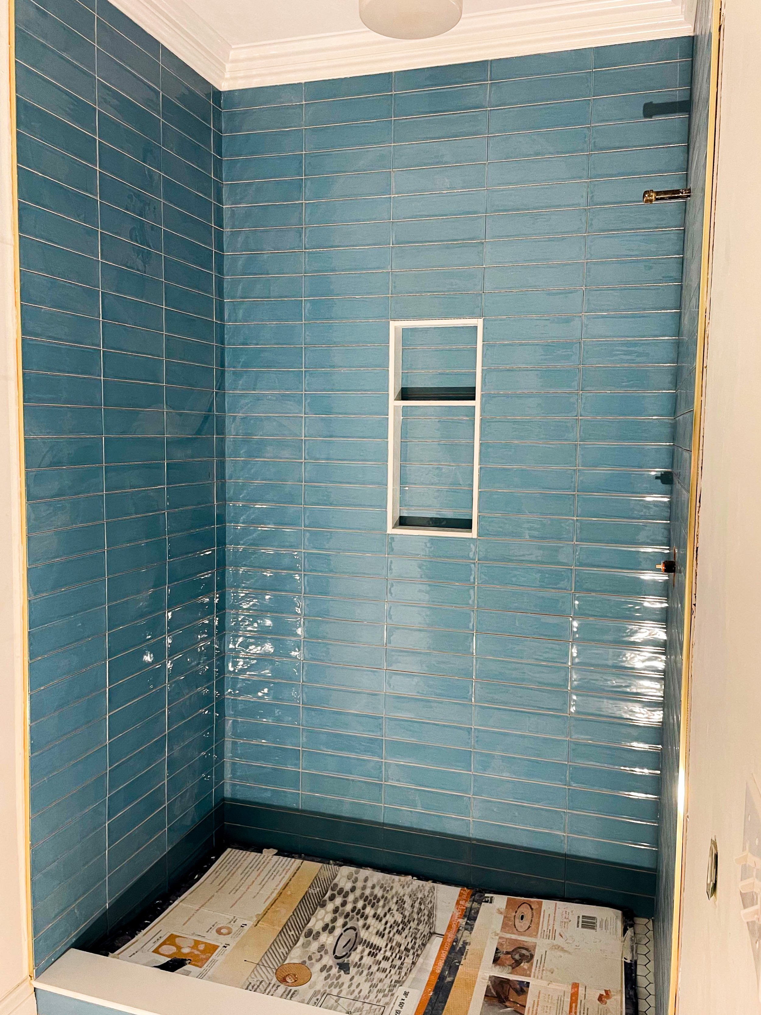 Blue horizontal rectangle shower tile