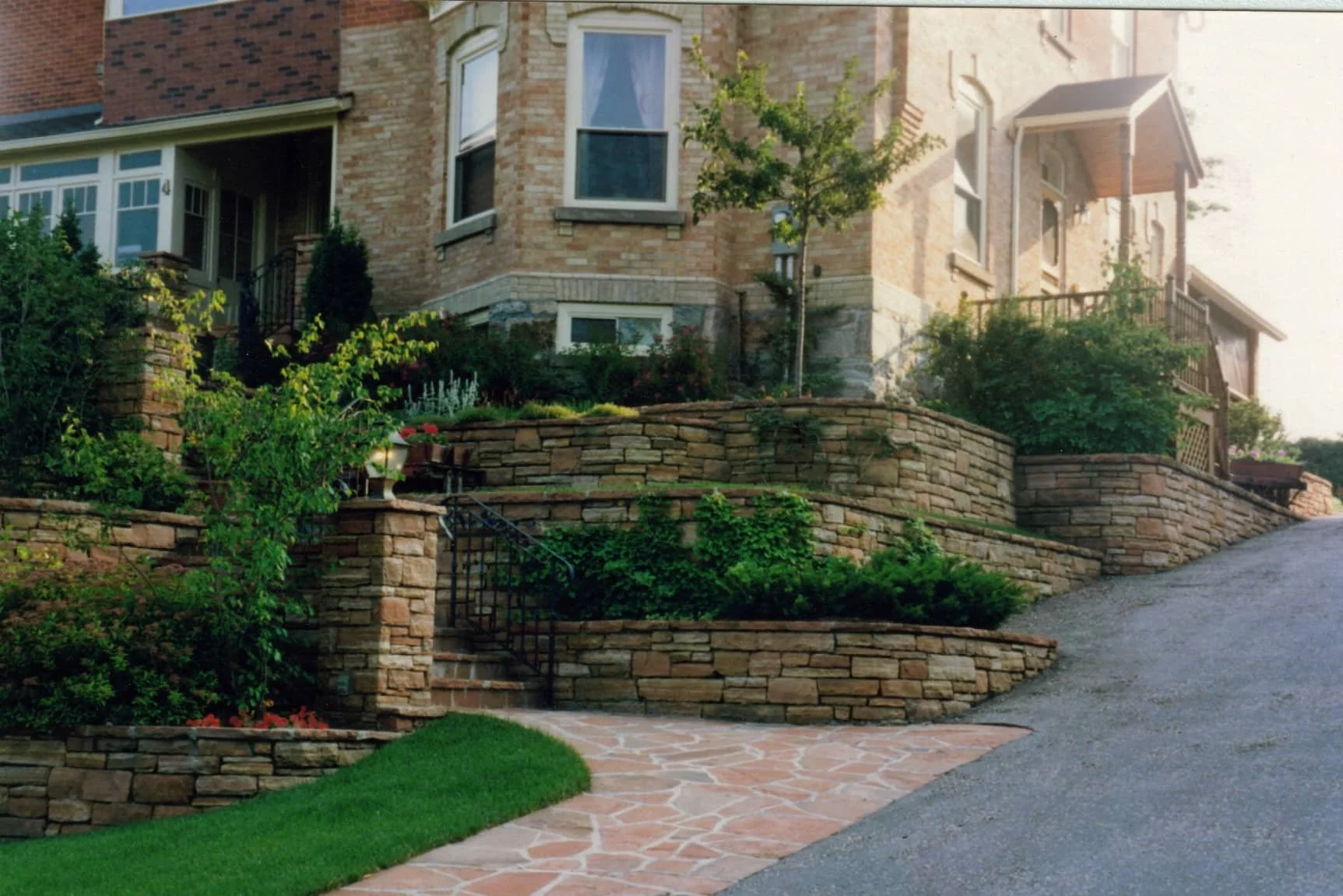 Traditional European Landscape Design With Stone Walls in Carson City, NV