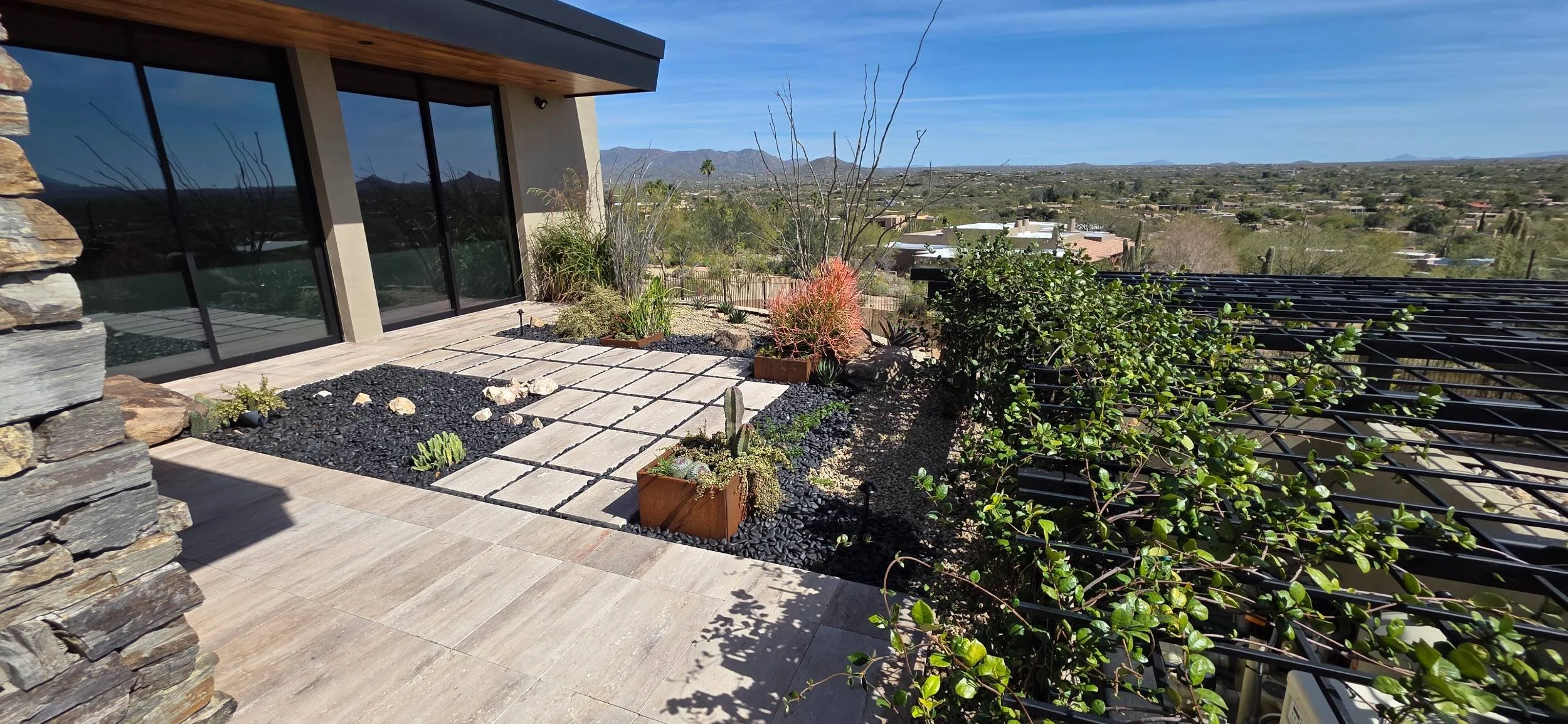 A backyard retreat with patio and pool and spa installation in Cave Creek, AZ