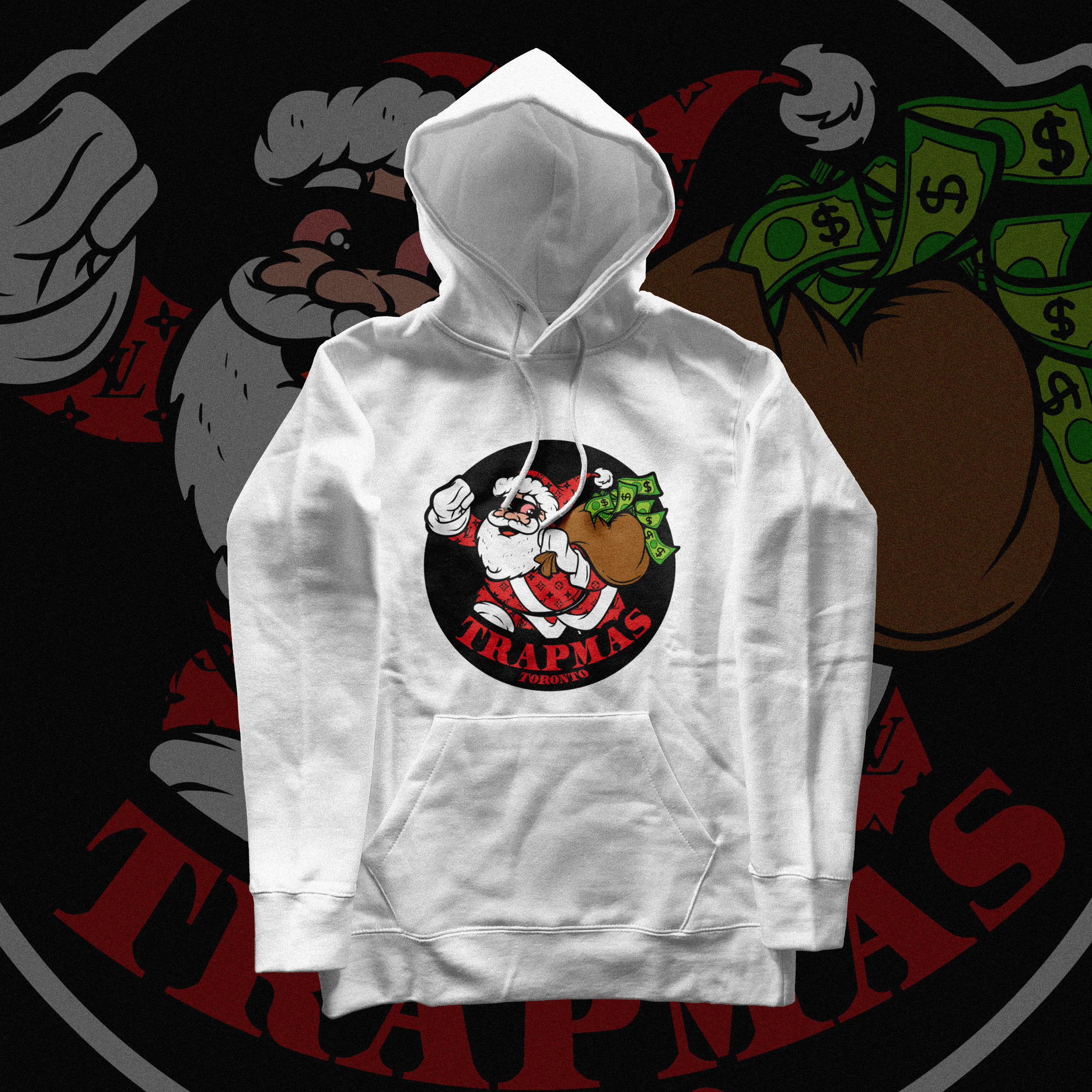 White hoodie with a graphic of Santa Claus holding a sack of money, with the text 'Trapmas Toronto' underneath, against a dark background with a larger, similar Santa illustration.