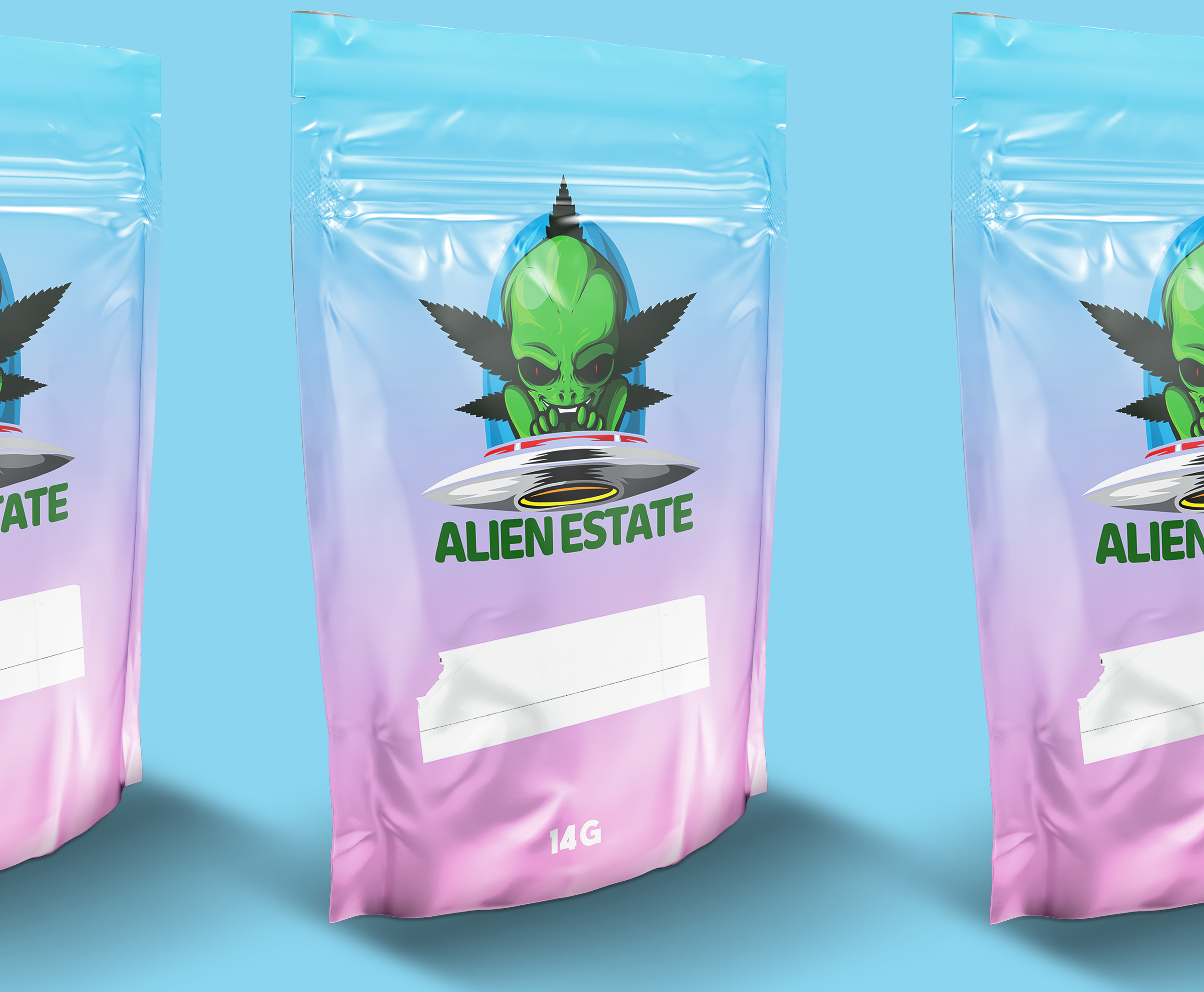 Packaging with a cartoon alien head with green skin, black eyes, and a black mustache, wearing spiked black hair and green gloves, with the text "ALIEN ESTATE" and a flying saucer below it, on a pastel-colored background.