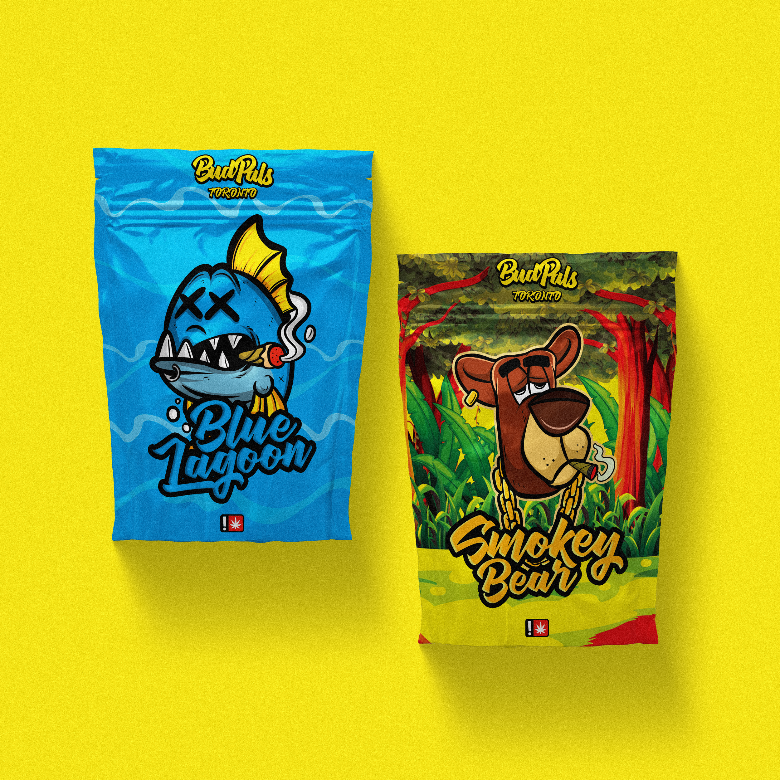 Colorful packaging of two cannabis products with cartoon animals; one blue fish labeled 'Blue Lagoon' and one brown bear labeled 'Smokey Bear' on a yellow background.