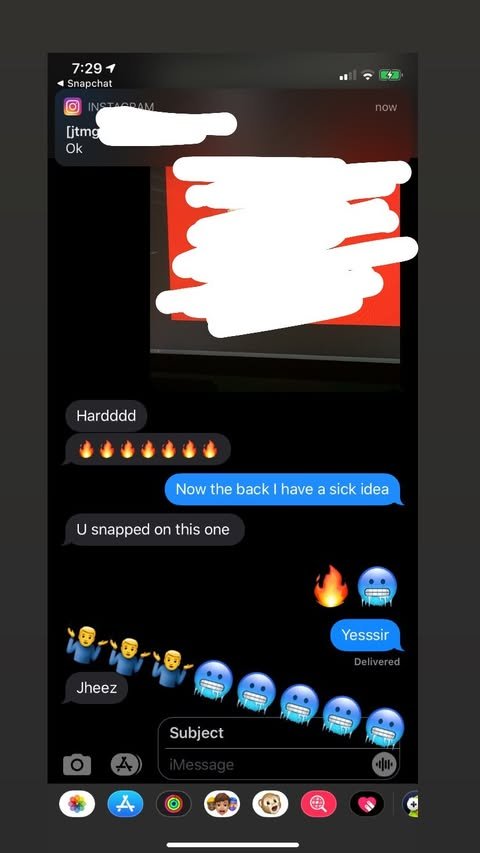 Screenshot of a text conversation on a smartphone, with various emojis including flames, blue face masks, and hugging figures, displayed on an iPhone with the time 7:29, showing part of a red and black screen in the background.