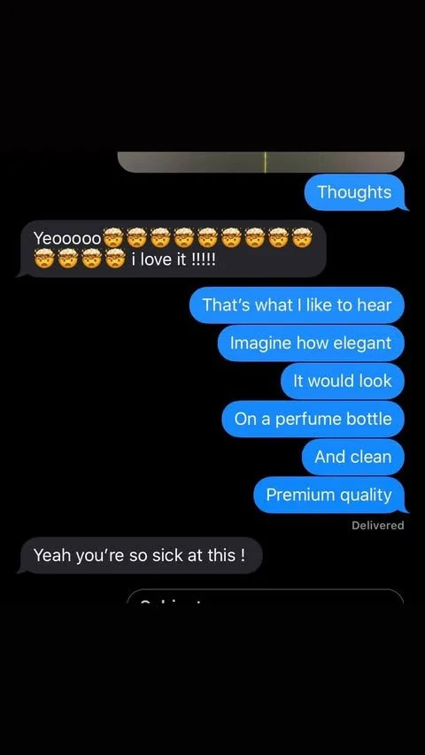 A conversation on a messaging app discussing a perfume bottle, with the user expressing interest in its appearance and quality, and the recipient reacting with excitement and admiration.