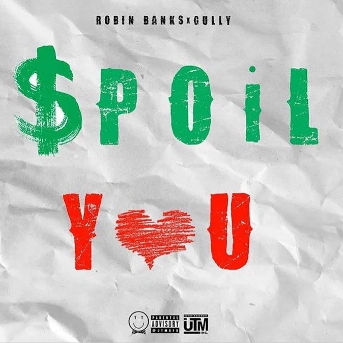 Crumpled paper with the text '$p0il' in green, 'Y' in red, a red heart in place of 'O', and 'U' in red. Small black and white logos at the bottom.