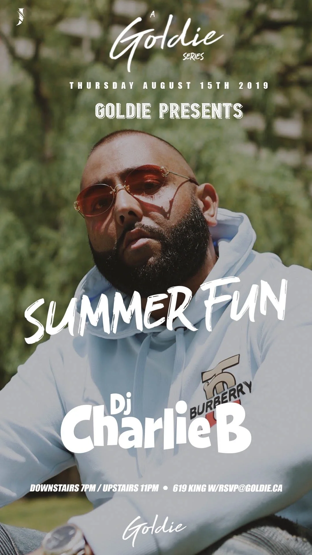 Event poster featuring a man with a beard and sunglasses, wearing a white hoodie, outdoors in a park, promoting a summer music event with DJ Charlie B on August 15, 2019.