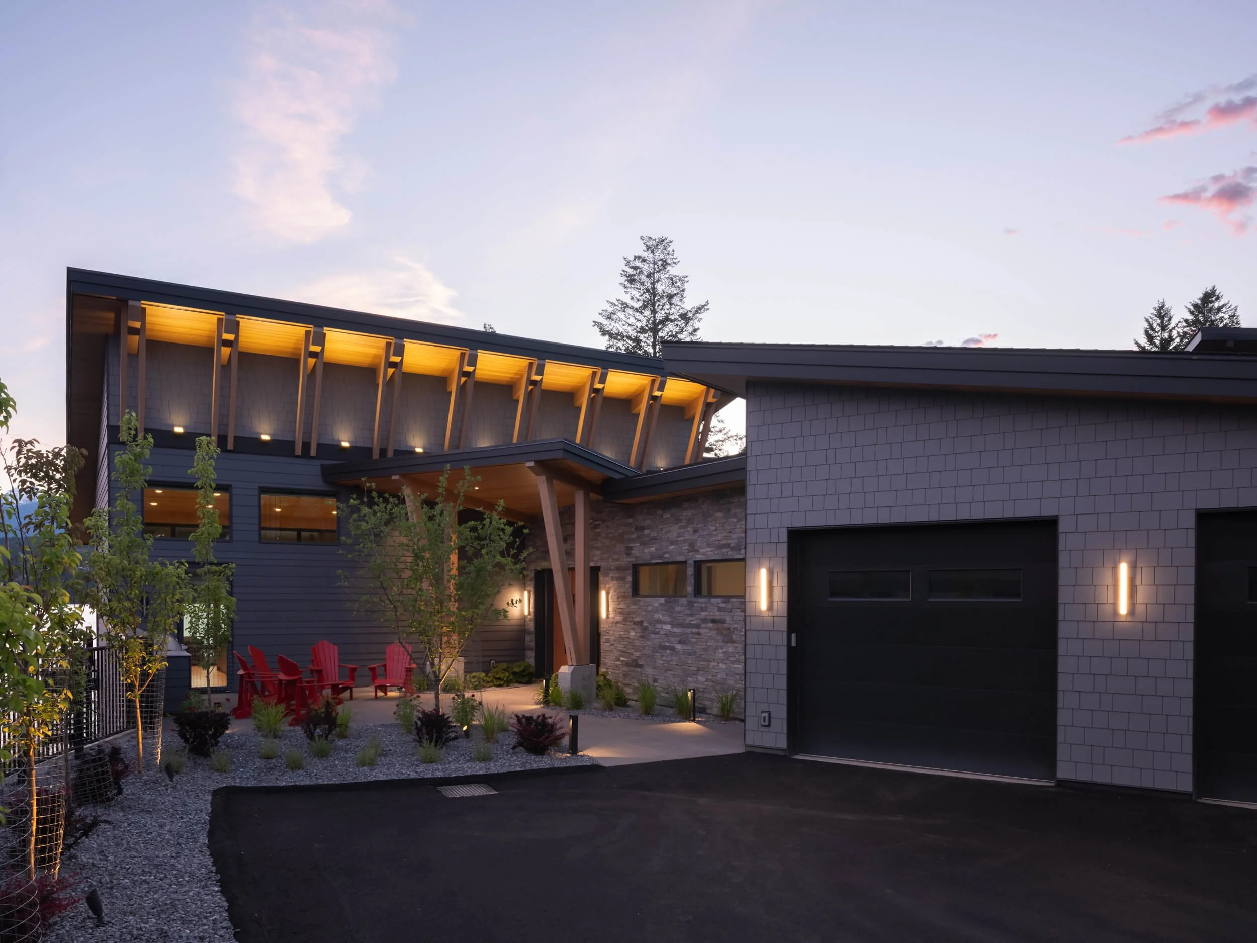 schmidt-residence-invermere-twilight-entry-uplit-timber-brackets-architectural-photographer-matt-anthony.jpg