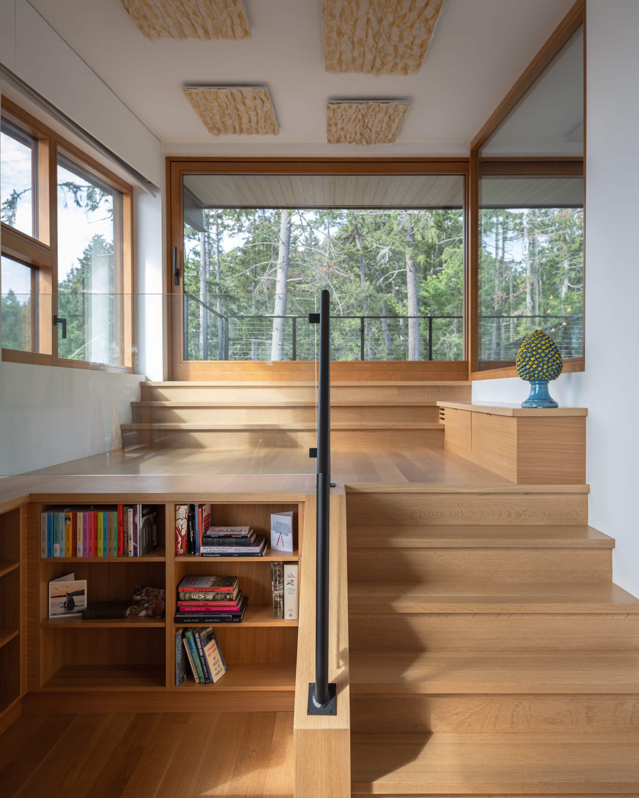 salt-spring-island-residence-oak-stair-and-built-in-bookshelf-architectural-photographer-matt-anthony.jpg