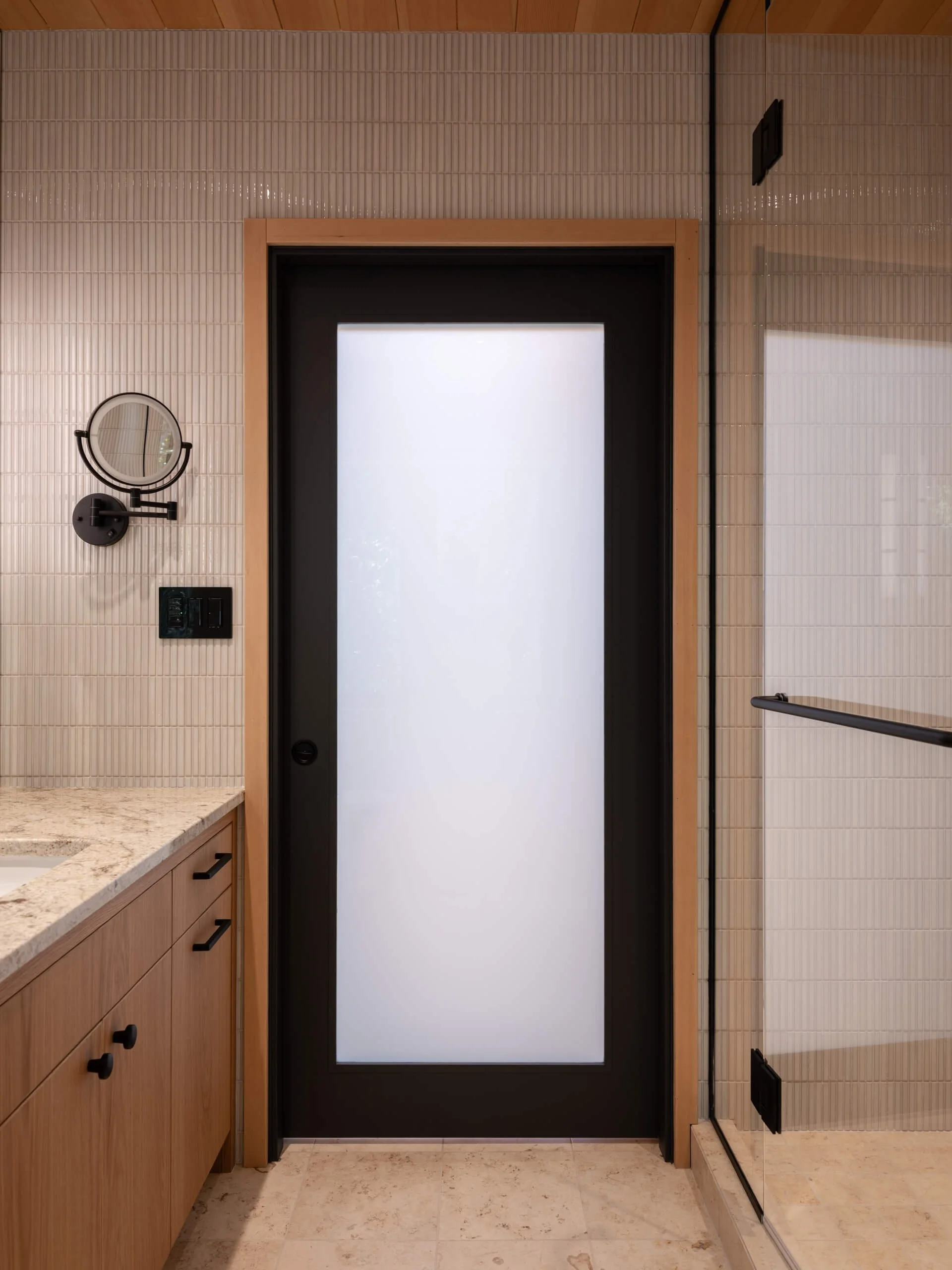 desolation-sound-residence-fluted-tile-bath-frosted-door-architectural-photographer-matt-anthony.jpg
