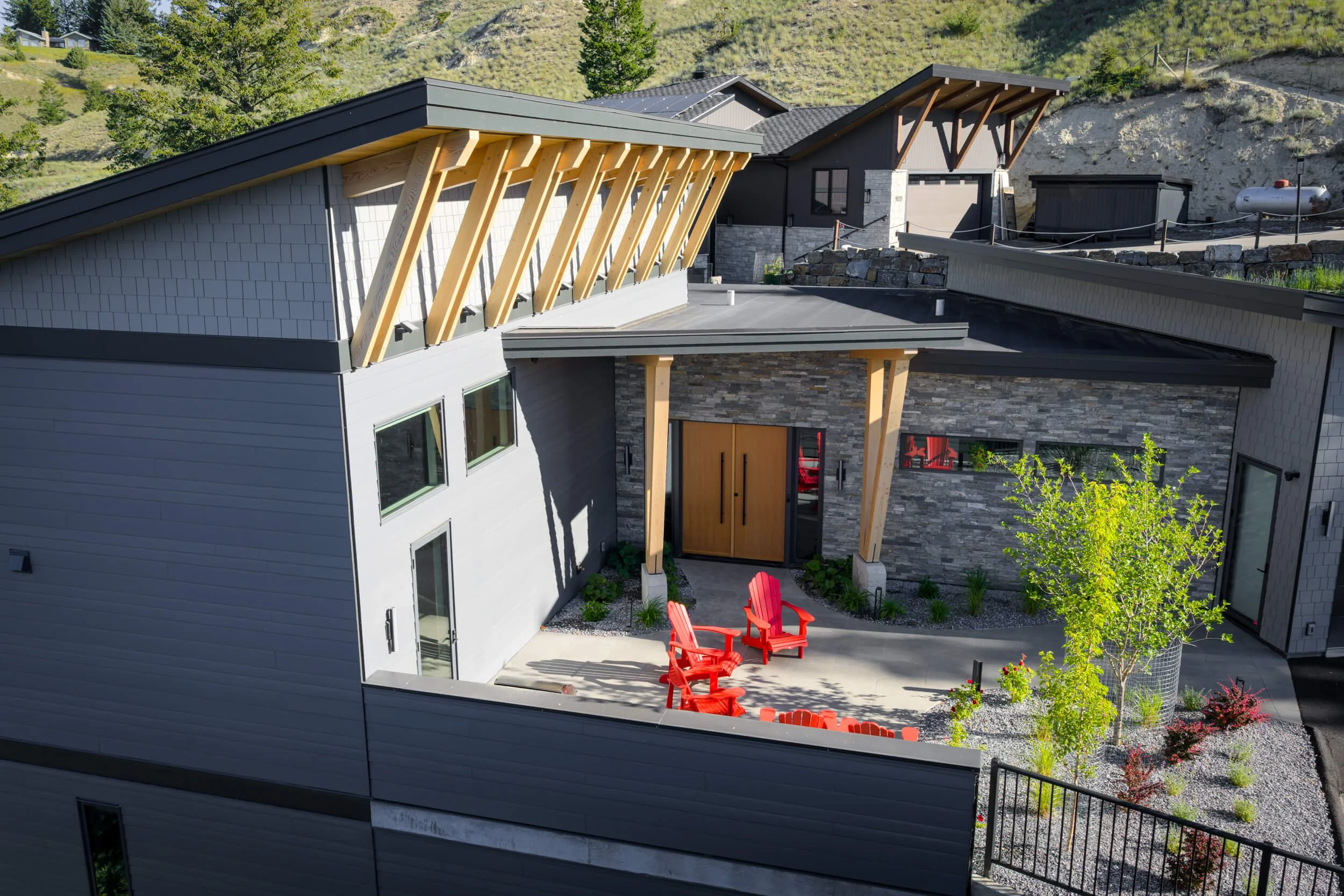 schmidt-residence-invermere-entry-courtyard-timber-rafters-architectural-photographer-matt-anthony.jpg