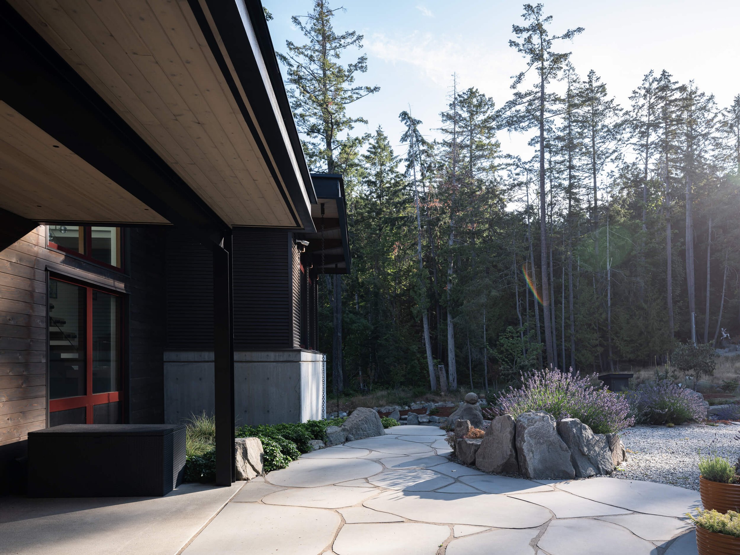 salt-spring-island-residence-flagstone-terrace-and-rain-chain-architectural-photographer-matt-anthony.jpg