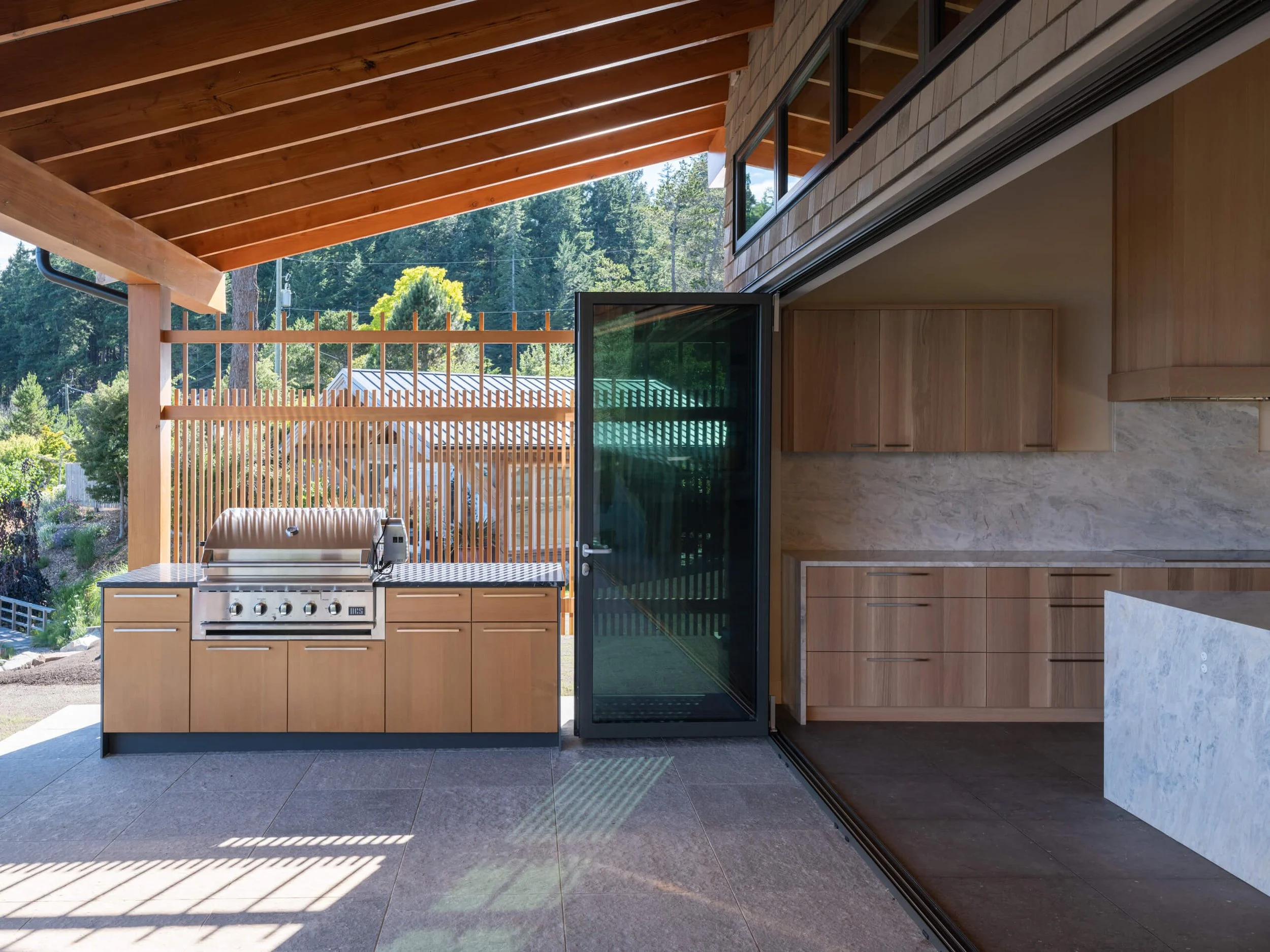 desolation-sound-residence-outdoor-kitchen-under-the-rafters-architectural-photographer-matt-anthony.jpg