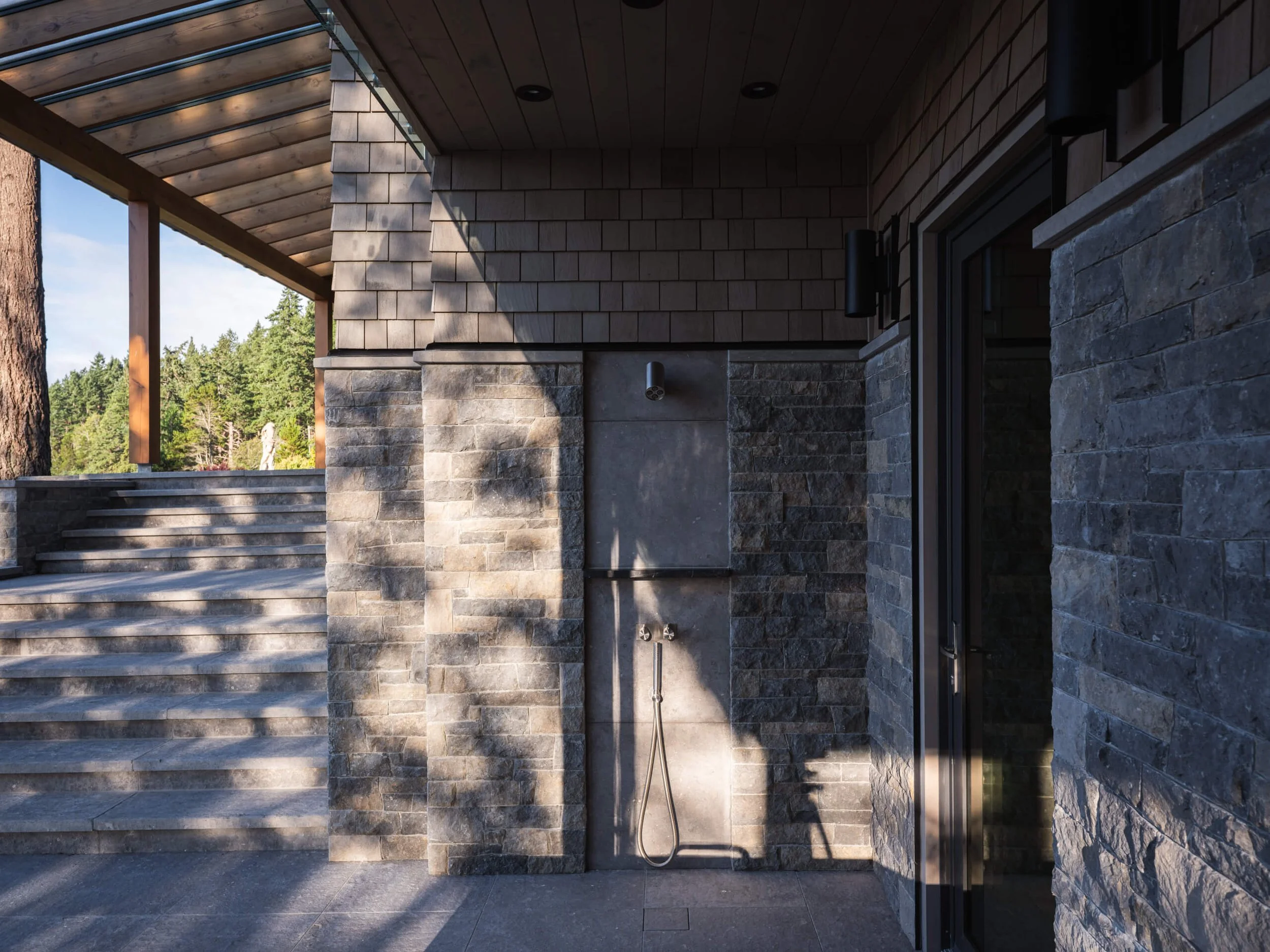 desolation-sound-residence-outdoor-shower-stone-wall-architectural-photographer-matt-anthony.jpg