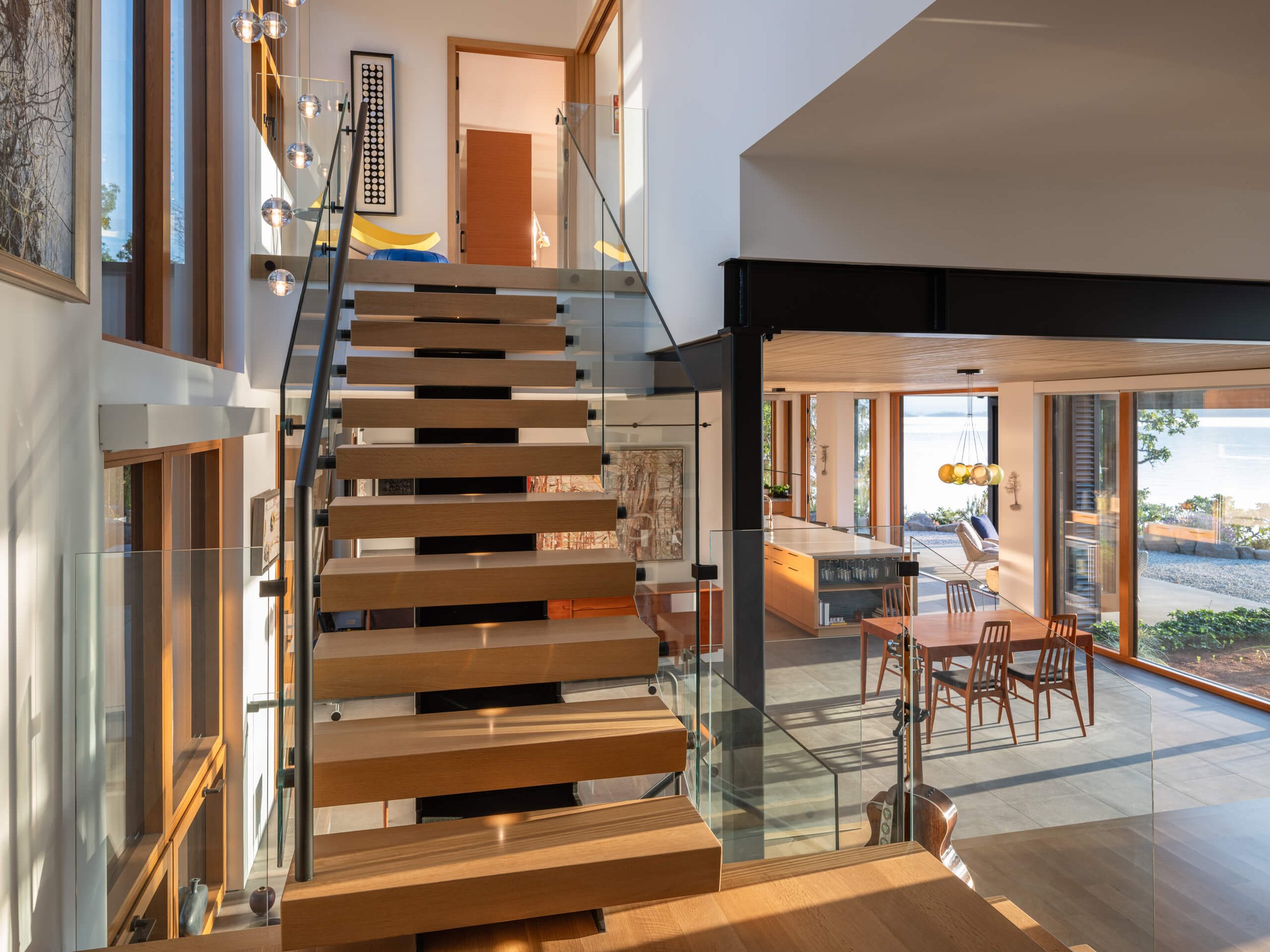 salt-spring-island-residence-floating-oak-stair-from-below-architectural-photographer-matt-anthony.jpg