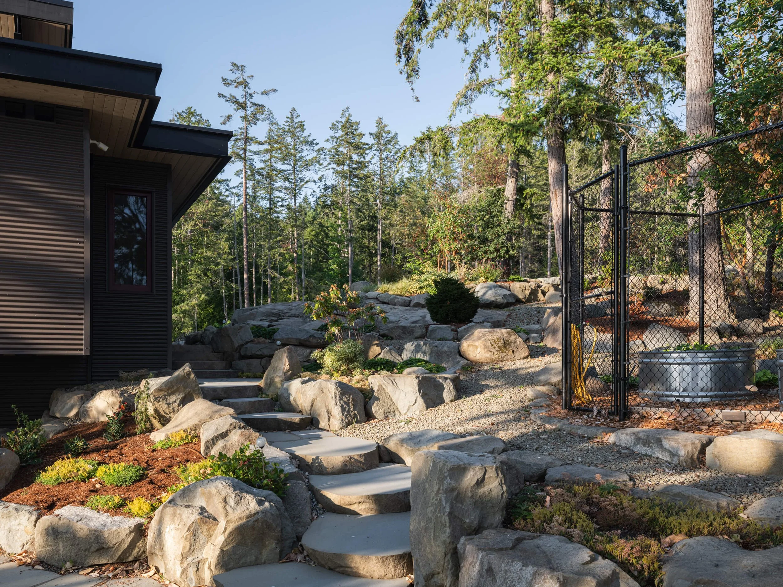 salt-spring-island-residence-rock-garden-stepping-stone-path-architectural-photographer-matt-anthony.jpg