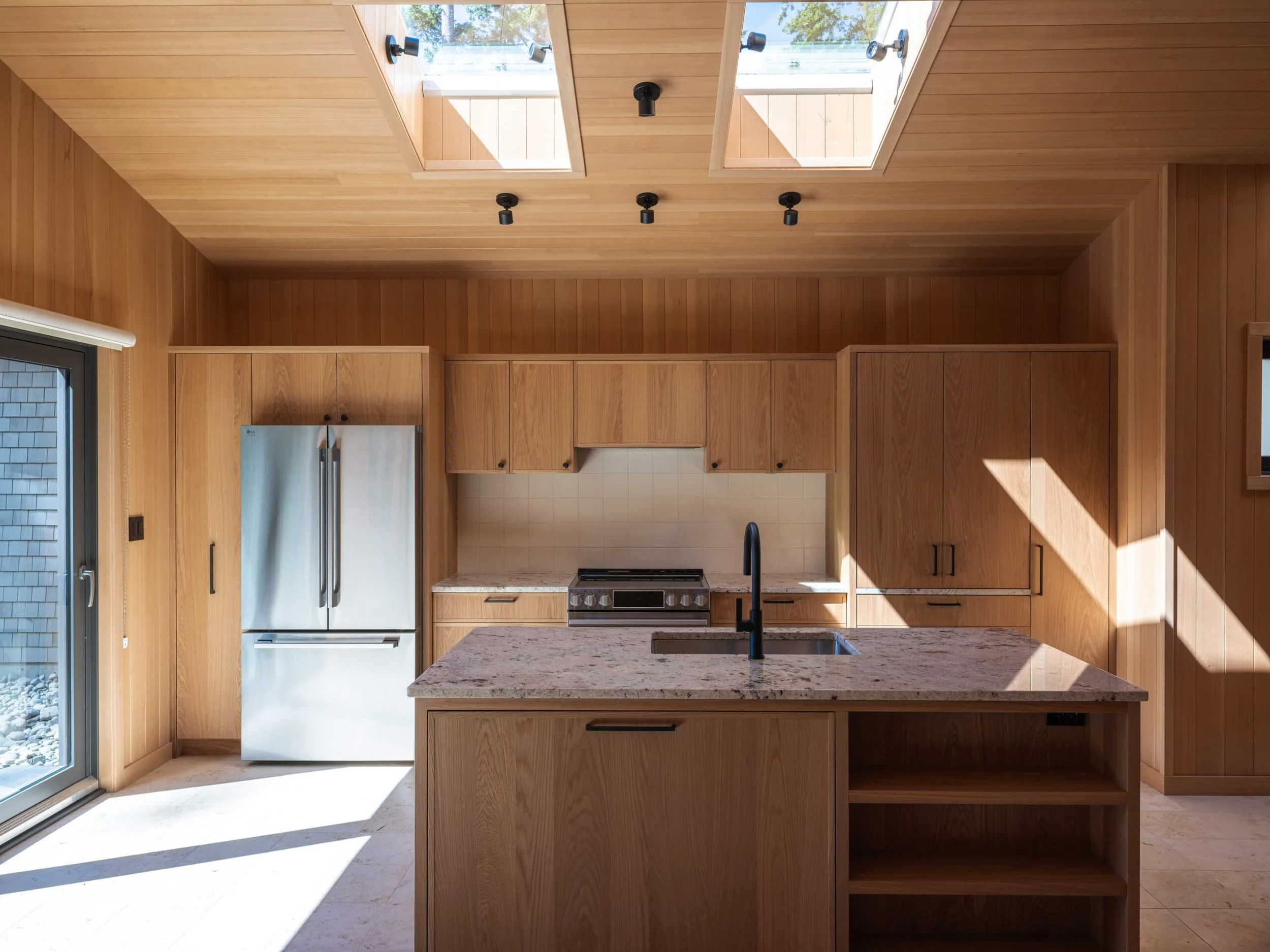 desolation-sound-residence-cabin-kitchen-skylights-fir-panelling-architectural-photographer-matt-anthony.jpg
