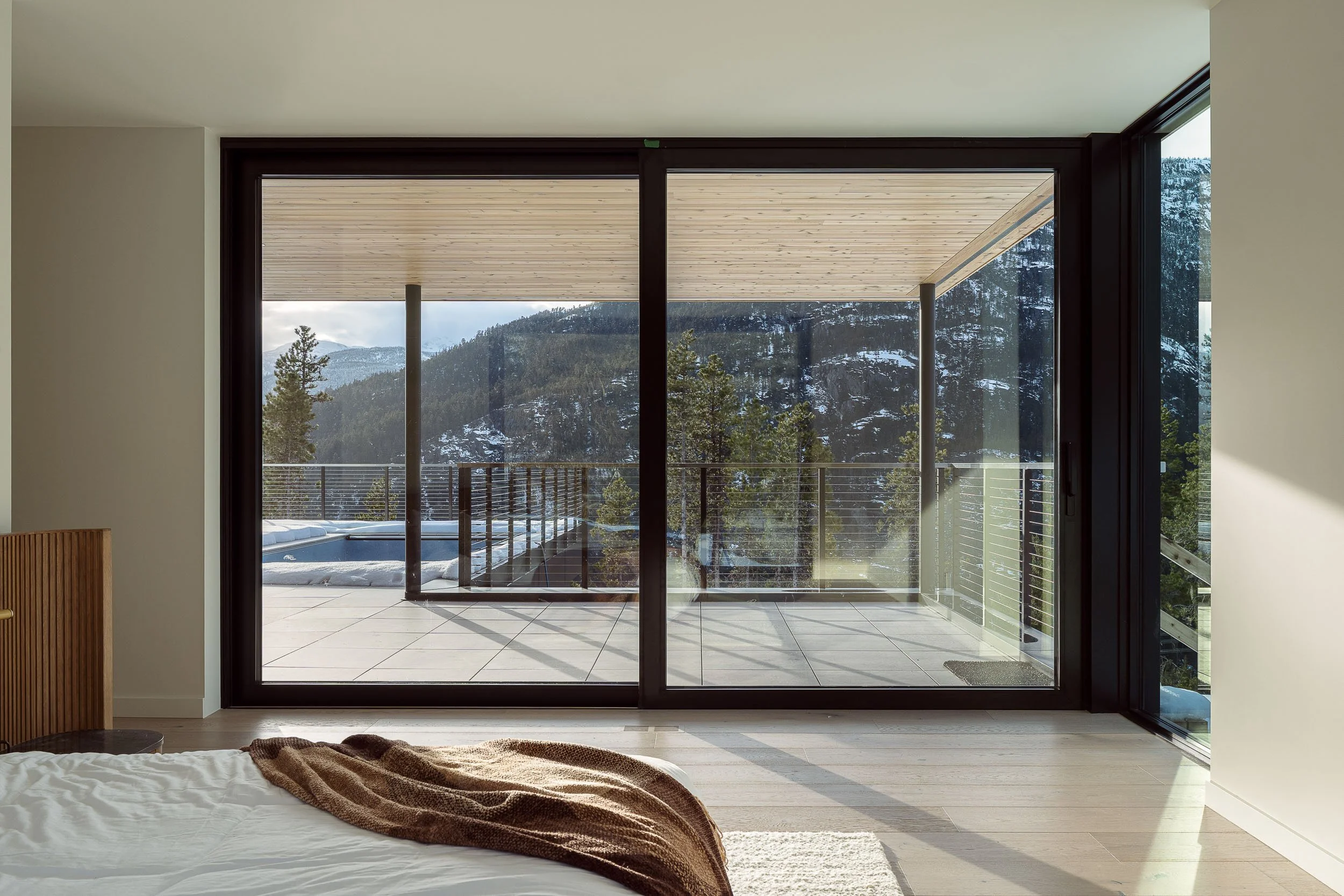 Warbler Residence rear elevation with mountain backdrop architectural photography