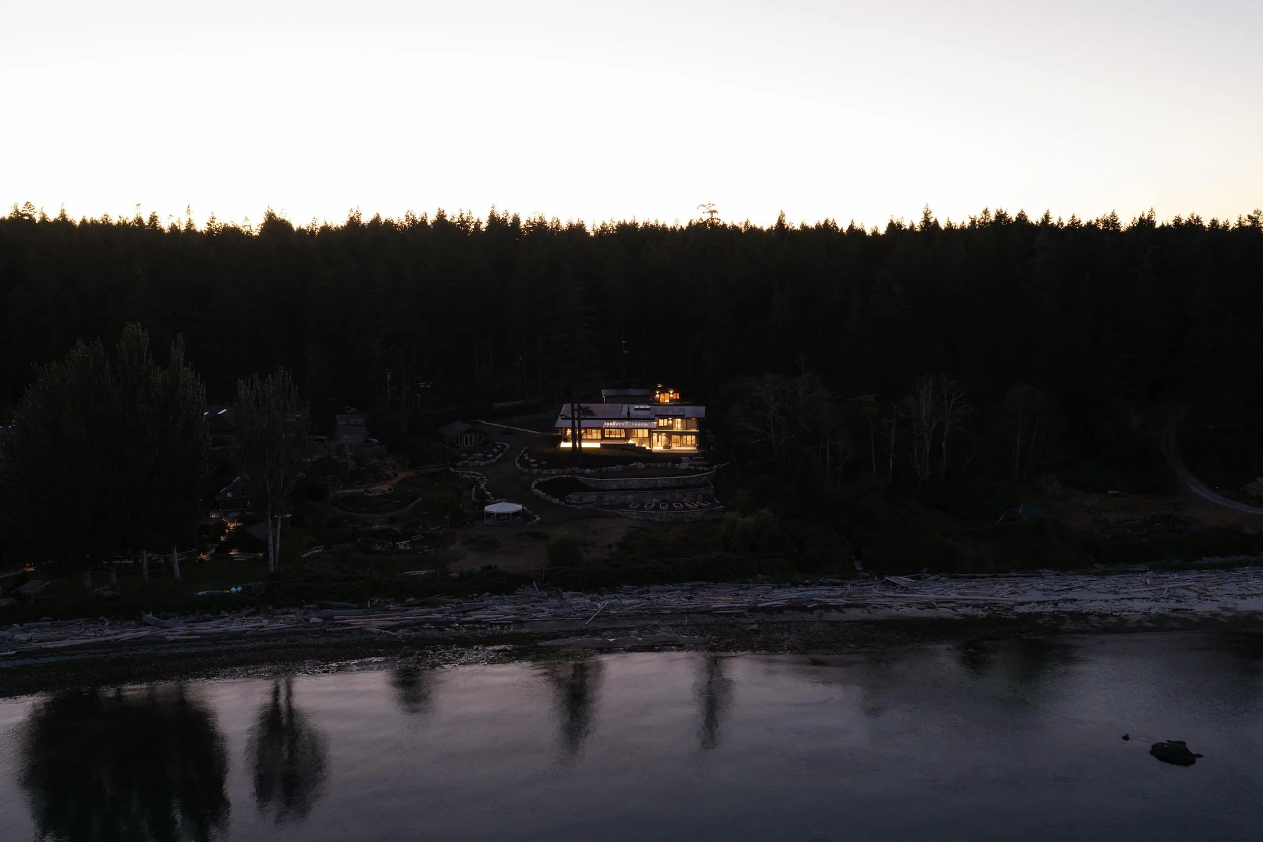 desolation-sound-residence-dusk-aerial-house-glowing-architectural-photographer-matt-anthony.jpg