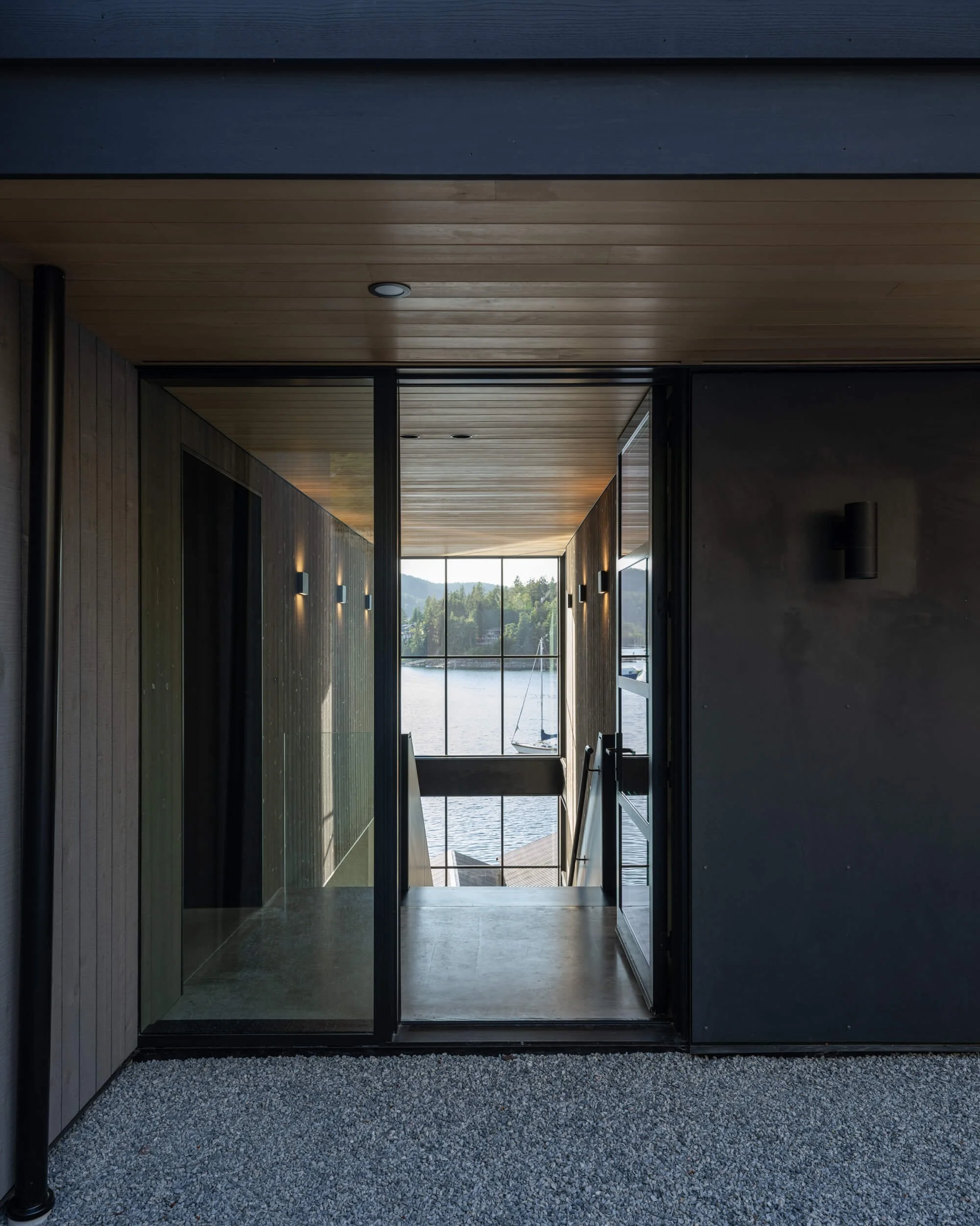 johnstone-road-madeira-park-dusk-entry-view-through-to-the-bay-architectural-photographer-matt-anthony.jpg