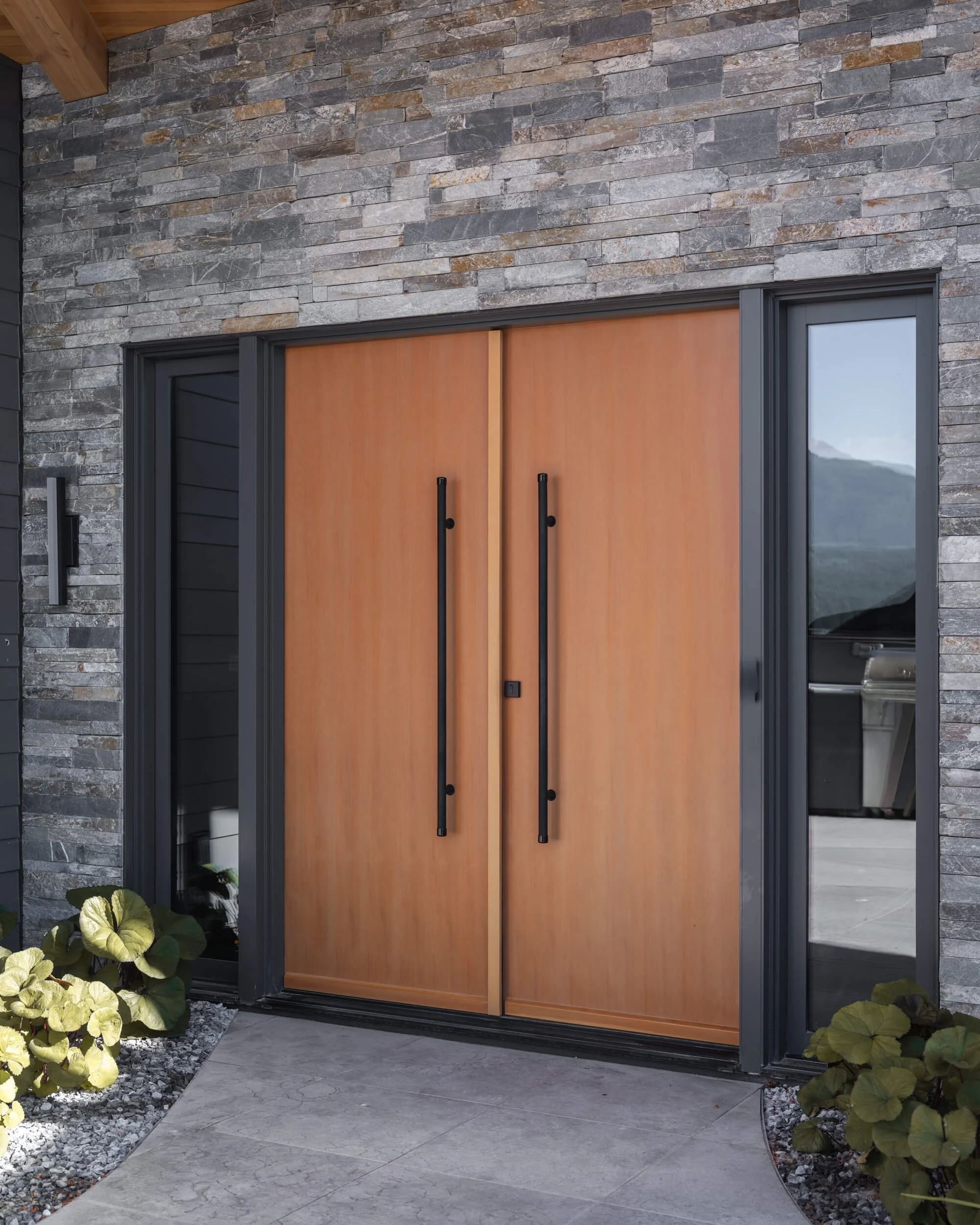 schmidt-residence-invermere-wood-double-entry-doors-architectural-photographer-matt-anthony.jpg