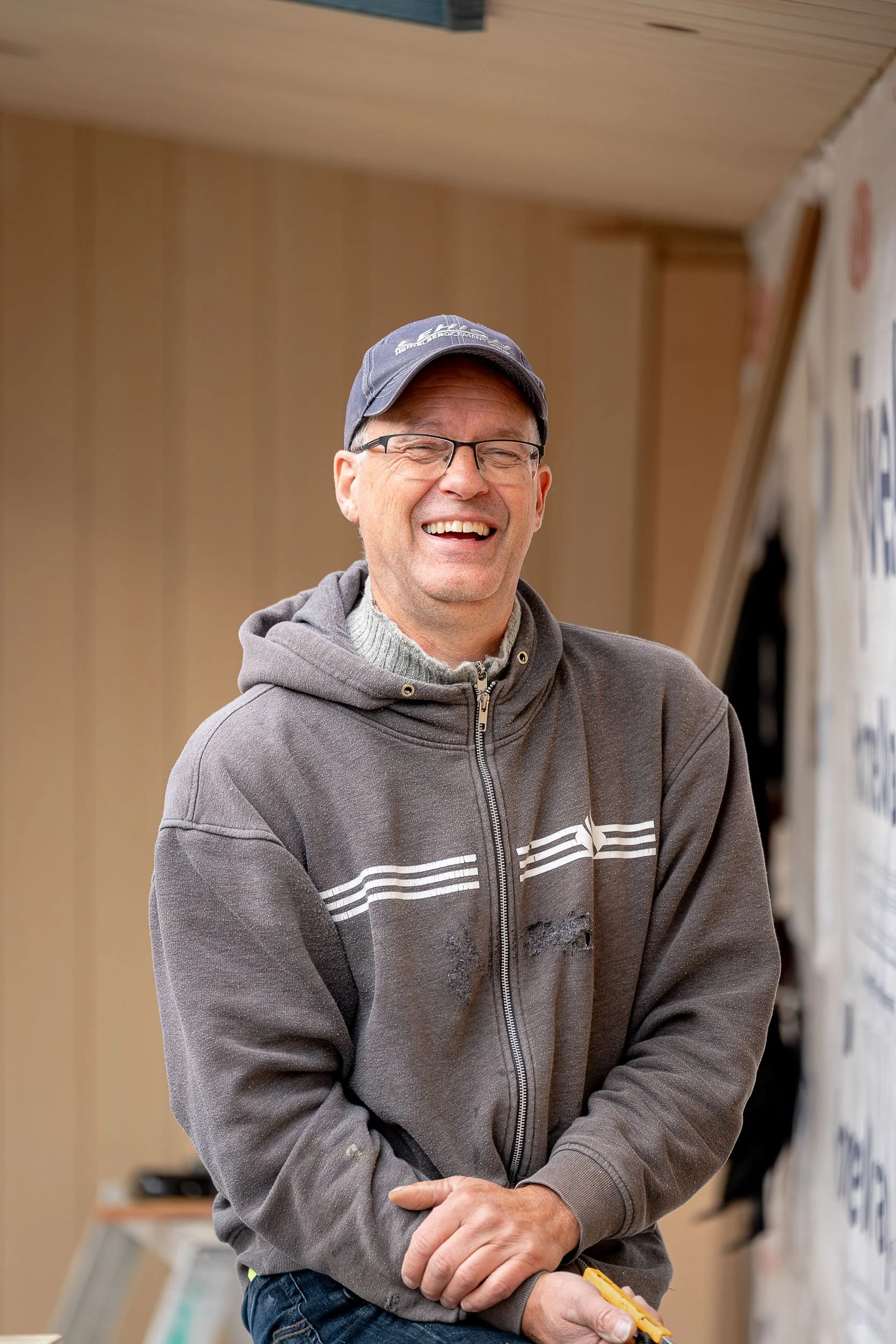 Summerhill Fine Homes team member environmental portrait on construction site