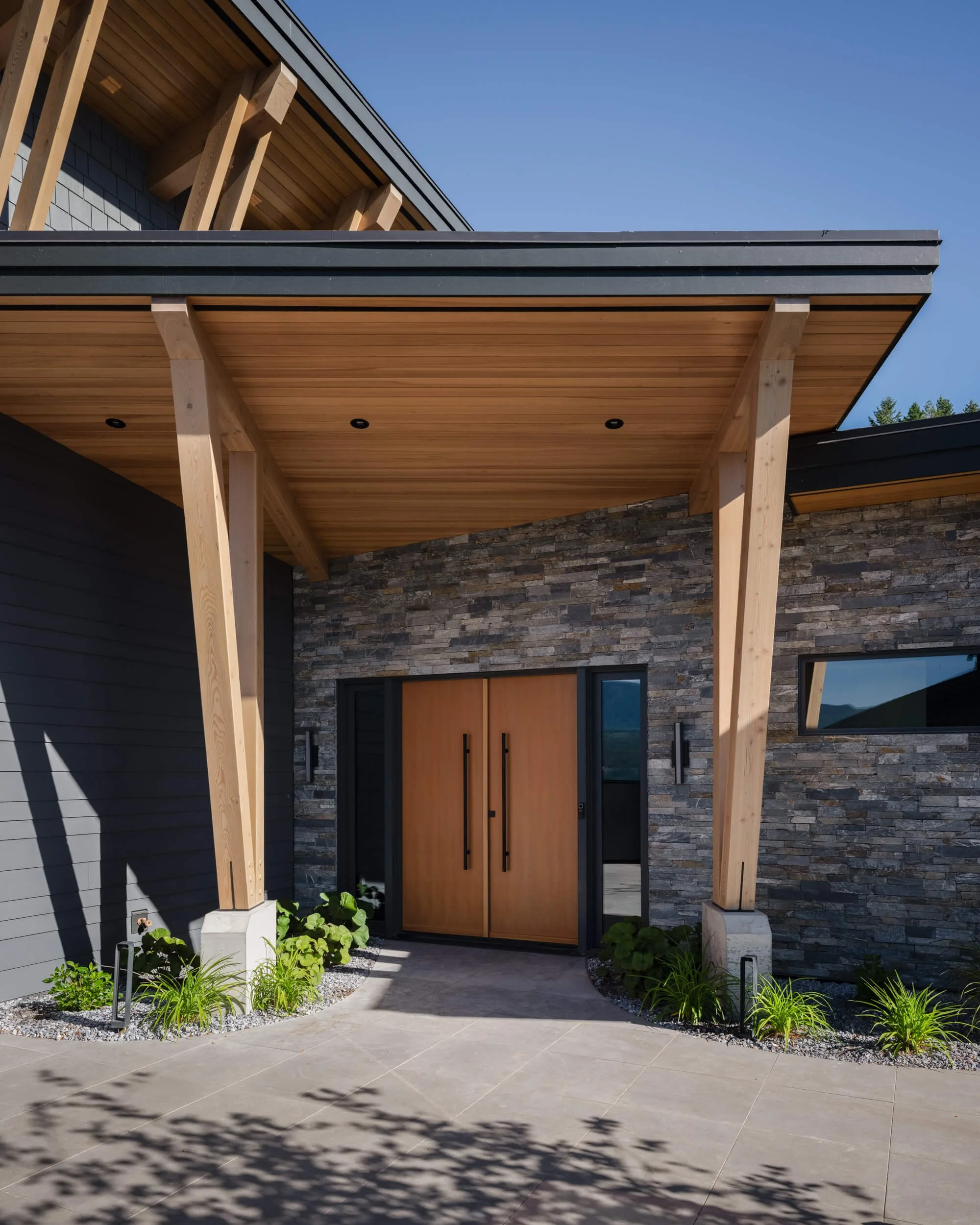 schmidt-residence-invermere-covered-entry-porch-timber-posts-architectural-photographer-matt-anthony.jpg