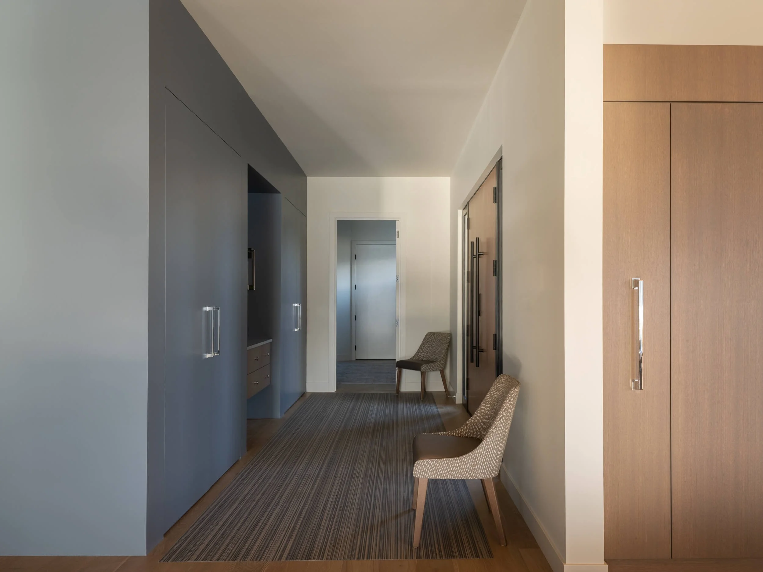 schmidt-residence-invermere-entry-hall-slate-blue-millwork-architectural-photographer-matt-anthony.jpg