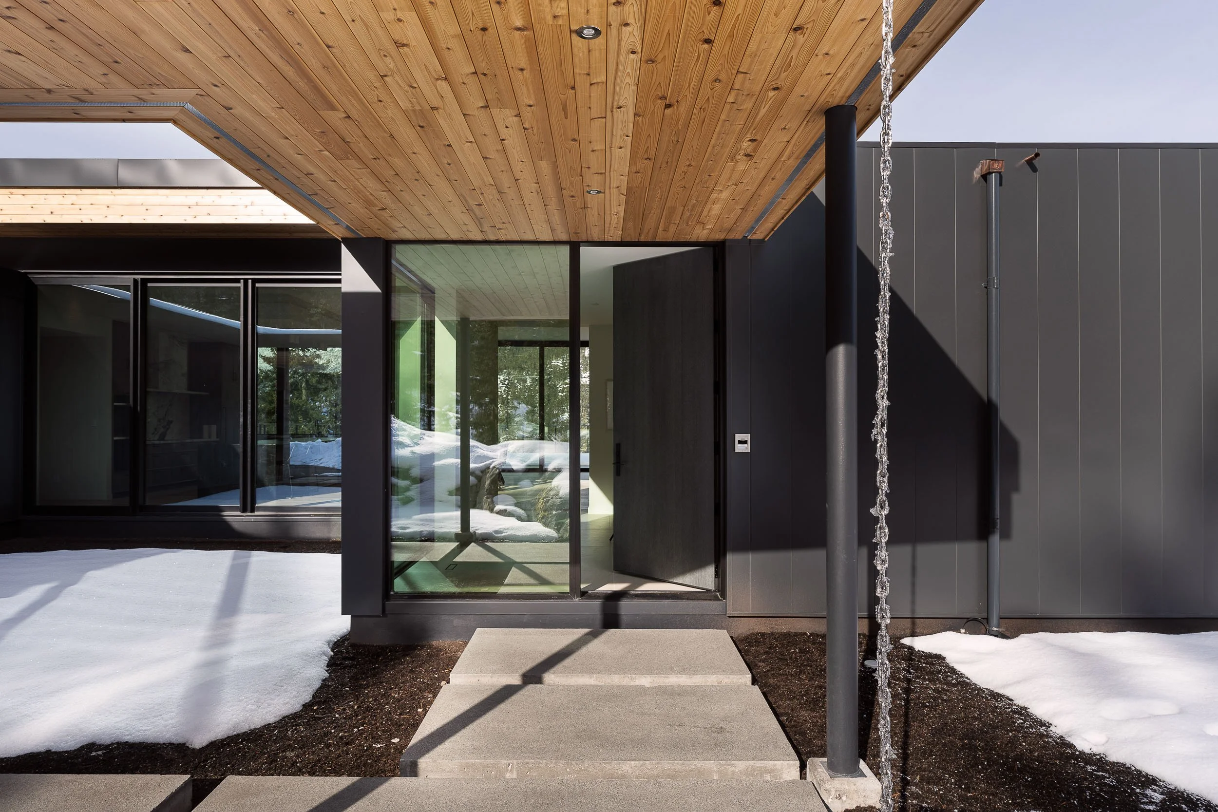 Warbler Residence Whistler interior living space warm natural light architectural photography