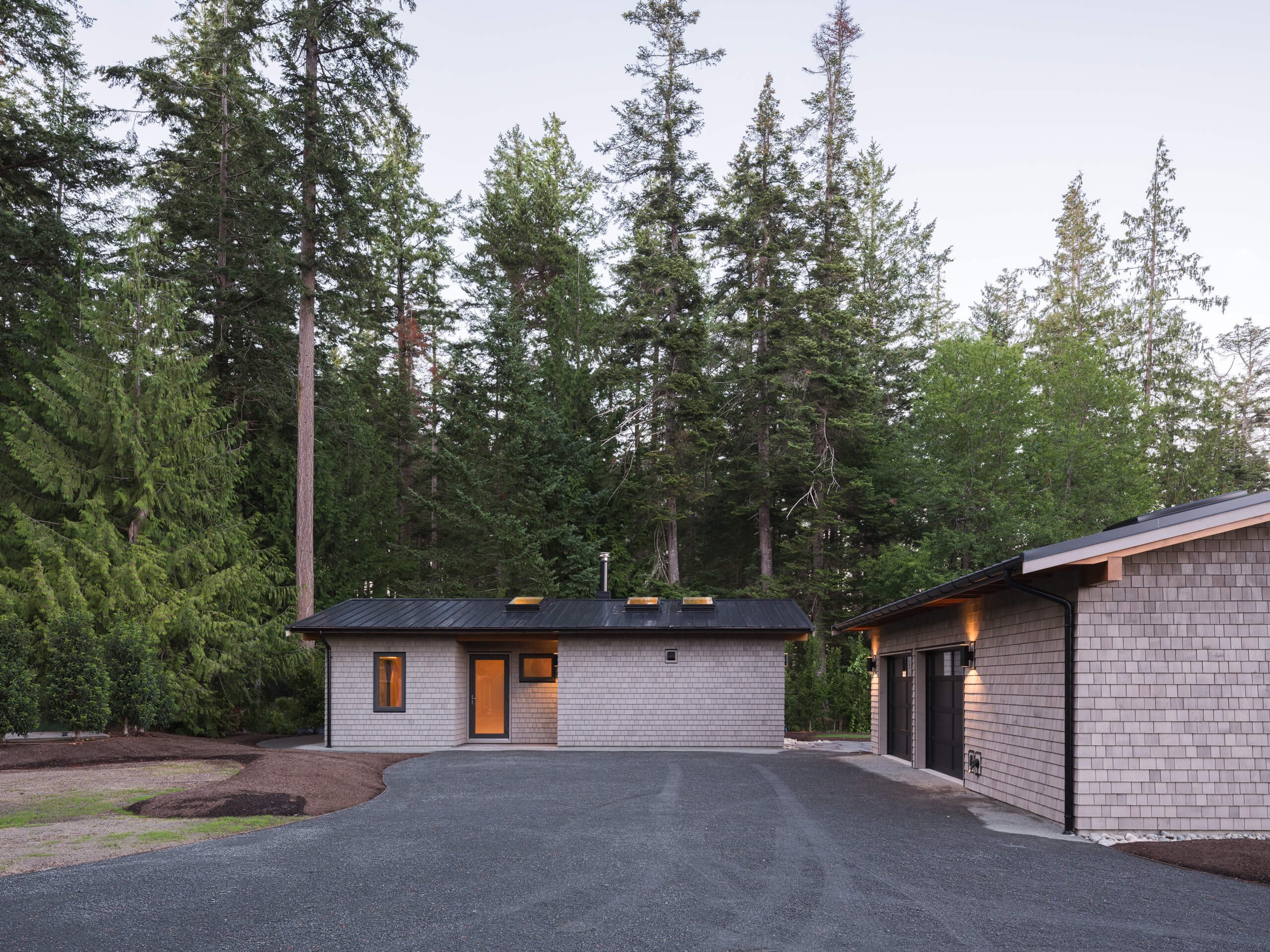 desolation-sound-residence-dusk-guest-cabin-and-garage-architectural-photographer-matt-anthony.jpg