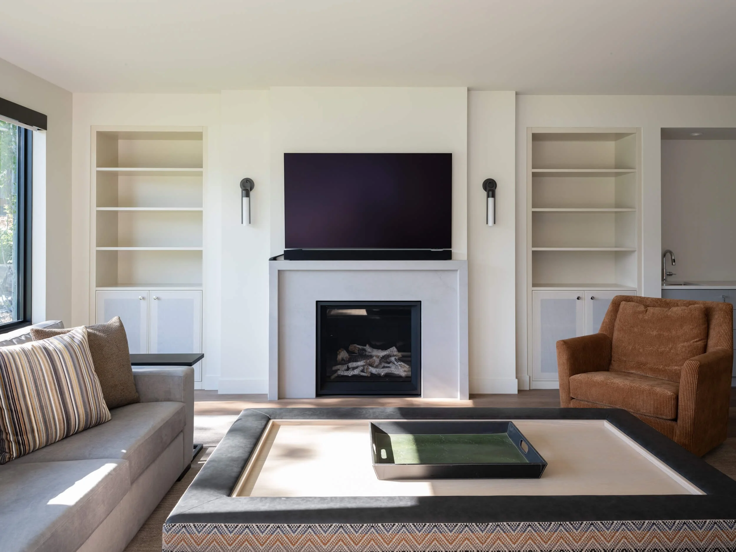 schmidt-residence-invermere-family-room-built-in-bookshelves-architectural-photographer-matt-anthony.jpg