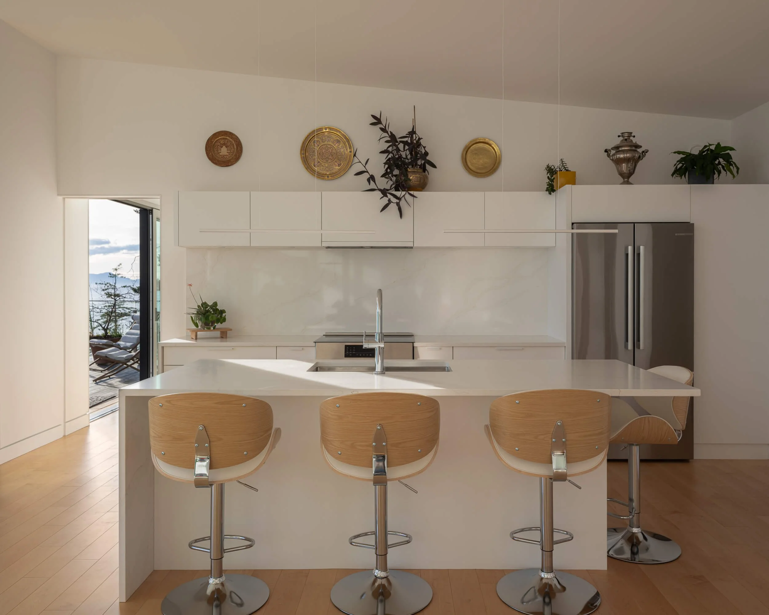 oles-cove-halfmoon-bay-white-kitchen-elevation-waterfall-island-architectural-photographer-matt-anthony.jpg