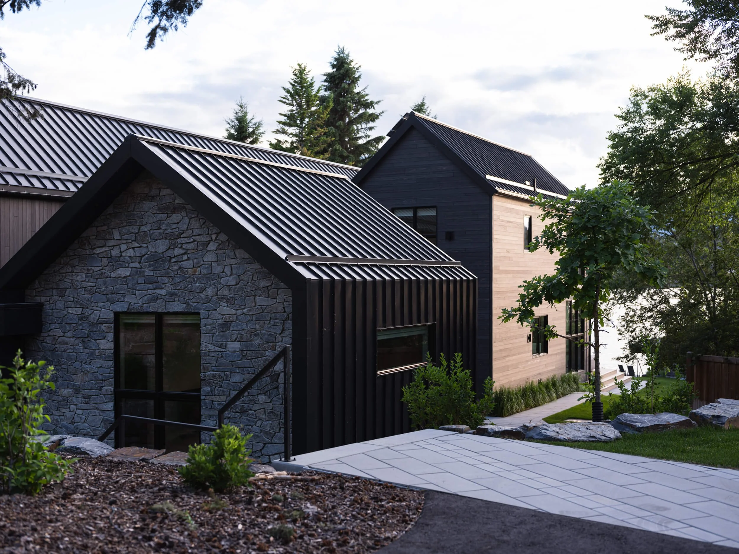 coleman-residence-invermere-dusk-stone-gable-stepped-roofs-architectural-photographer-matt-anthony.jpg
