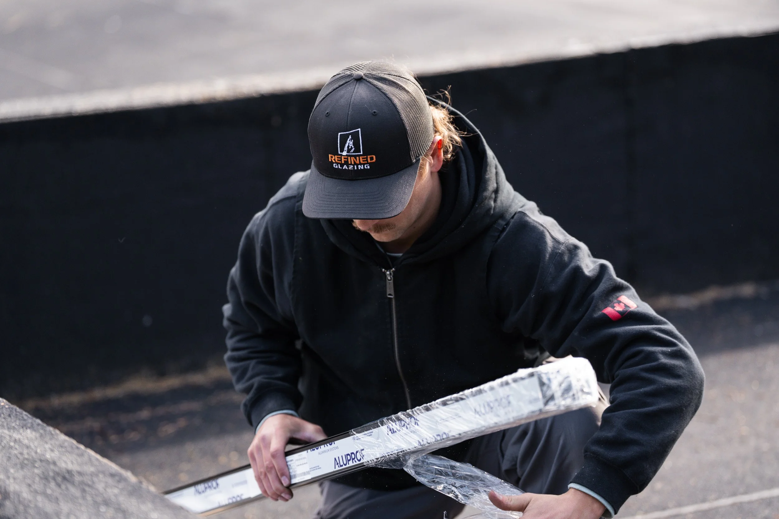 Refined Glazing construction lifestyle photography showing crew and craftsmanship