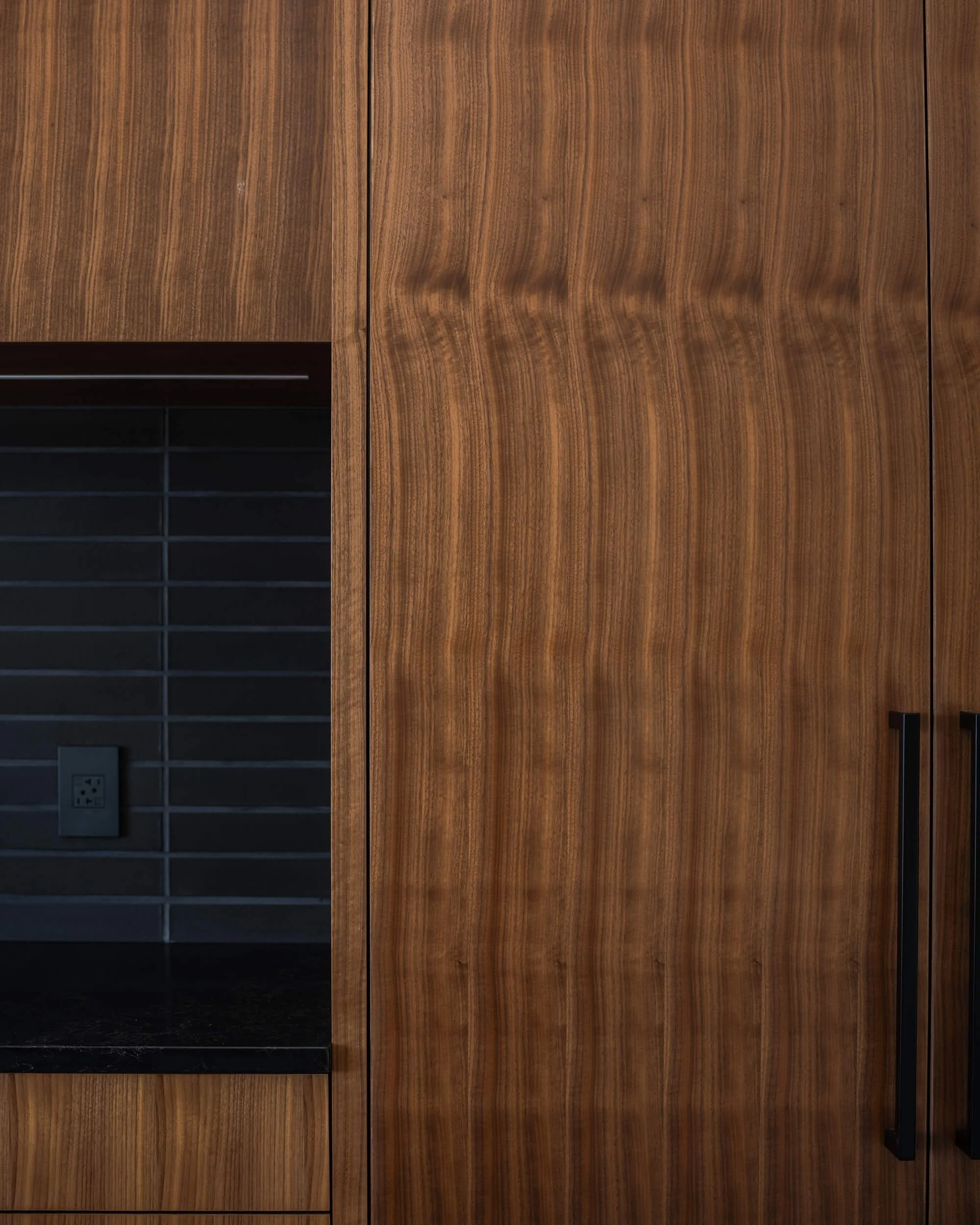 johnstone-road-madeira-park-walnut-cabinetry-black-tile-niche-architectural-photographer-matt-anthony.jpg