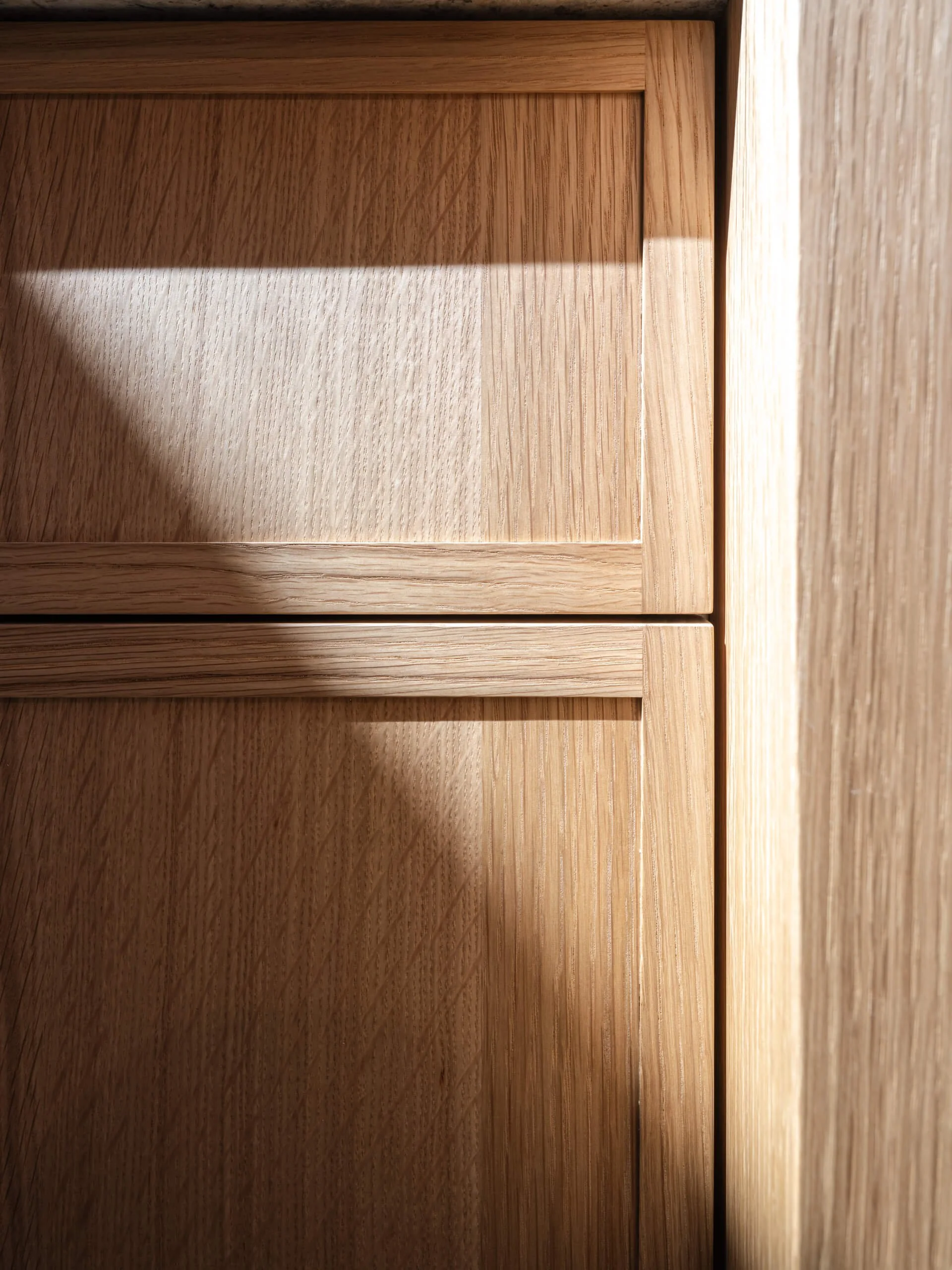 desolation-sound-residence-white-oak-cabinet-light-study-architectural-photographer-matt-anthony.jpg
