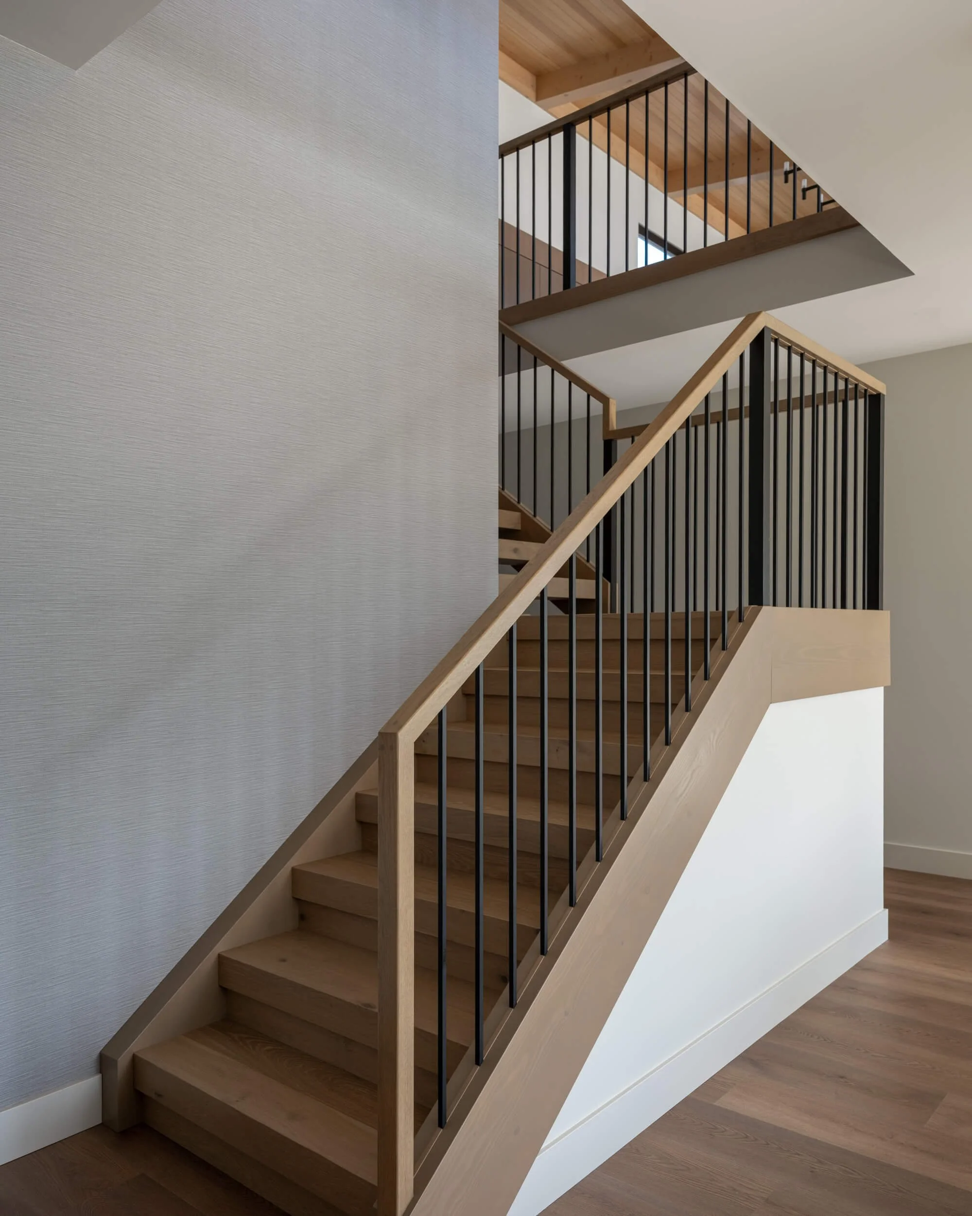 schmidt-residence-invermere-white-oak-open-staircase-architectural-photographer-matt-anthony.jpg