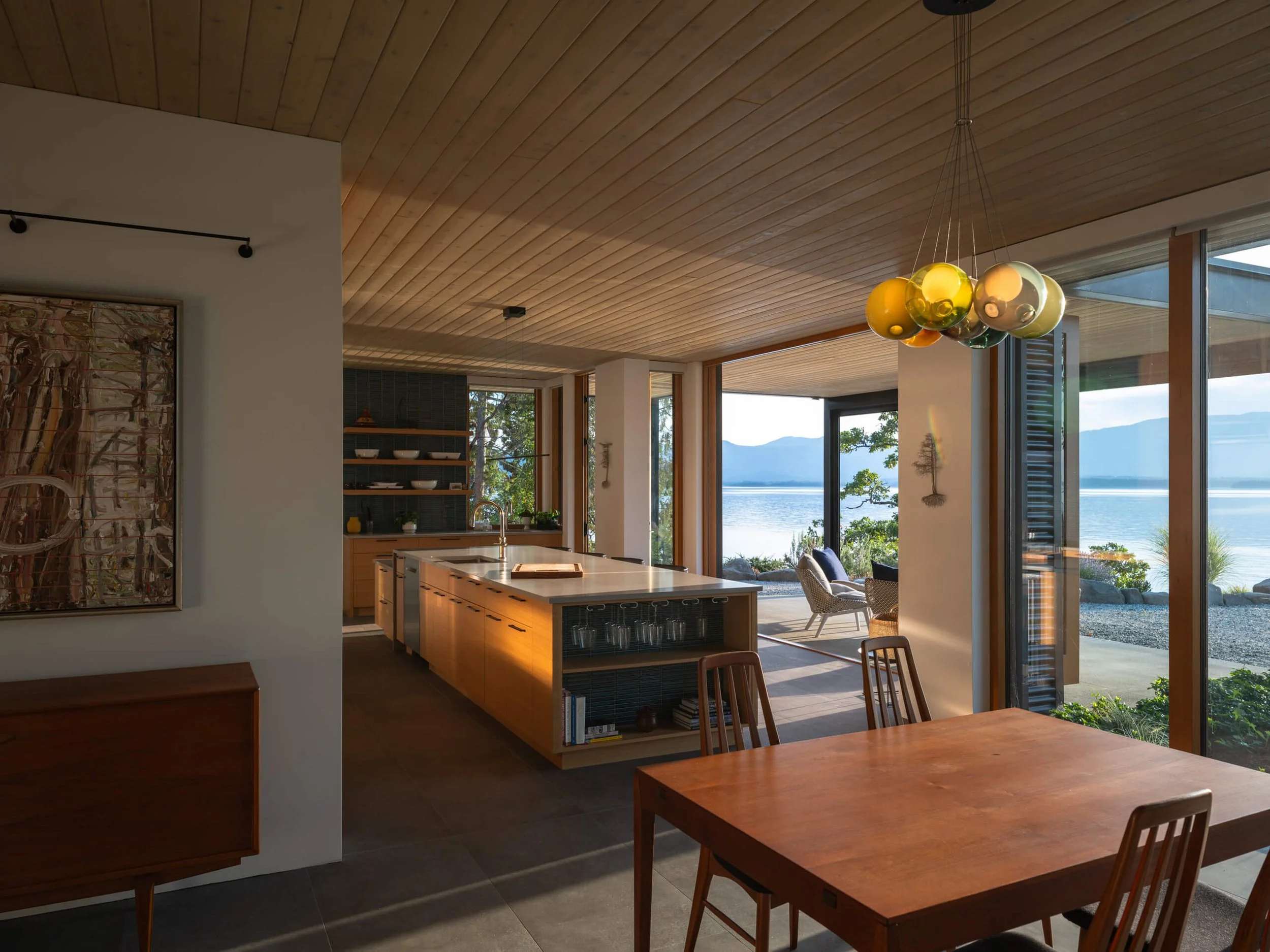 salt-spring-island-residence-dining-and-kitchen-glass-pendants-architectural-photographer-matt-anthony.jpg