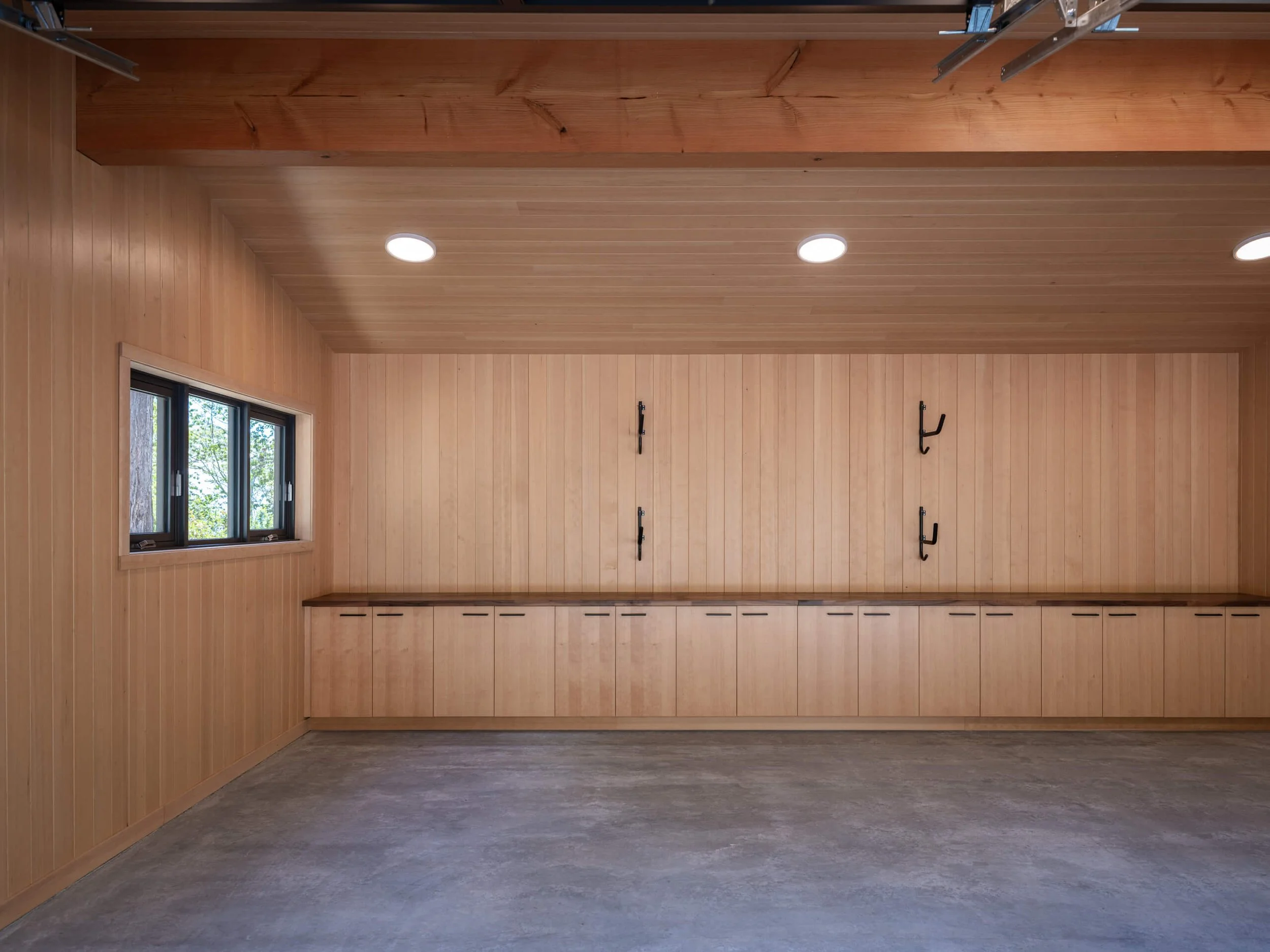 desolation-sound-residence-garage-fir-cabinetry-workbench-architectural-photographer-matt-anthony.jpg