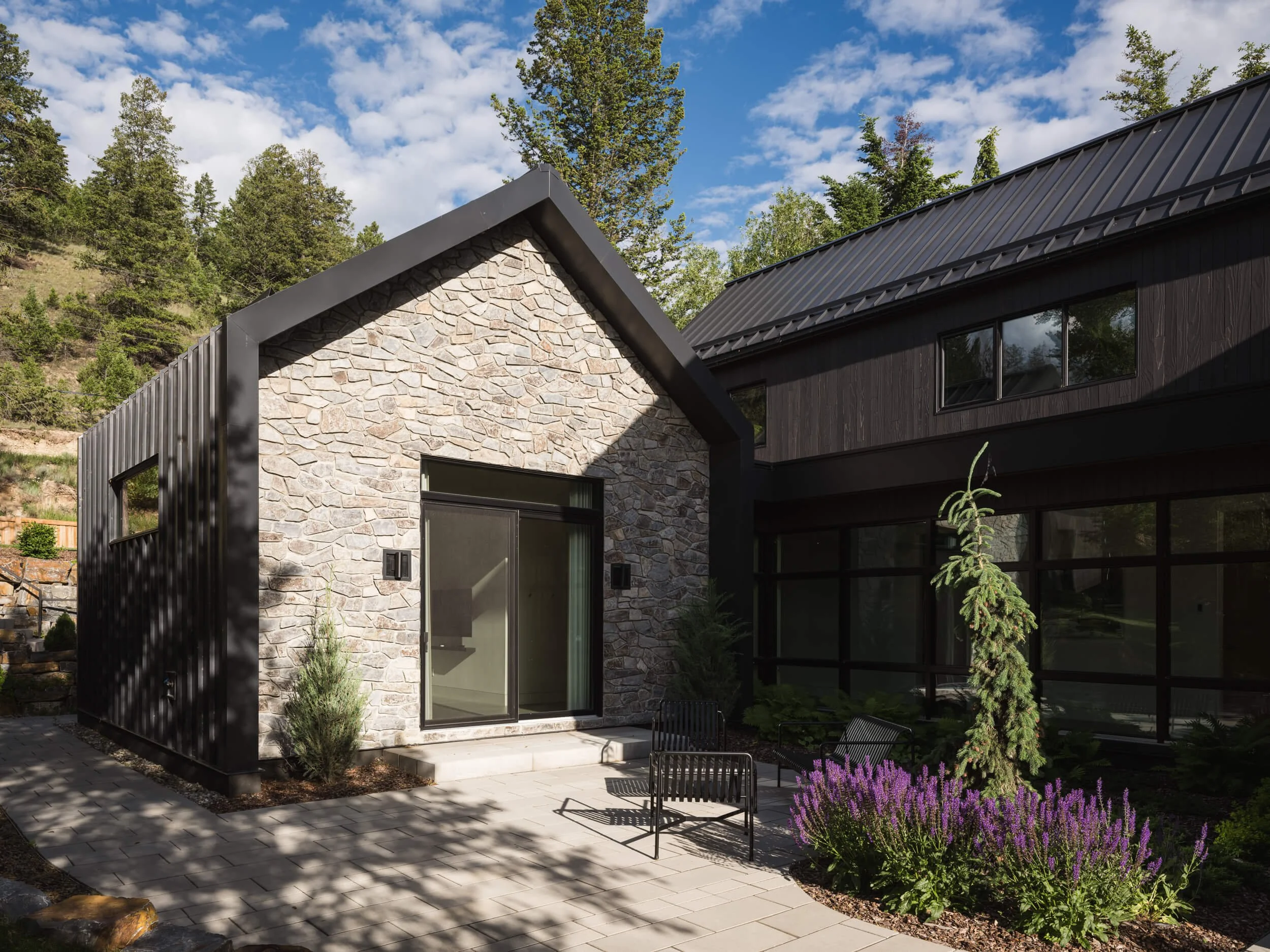 coleman-residence-invermere-stone-guest-gable-courtyard-architectural-photographer-matt-anthony.jpg
