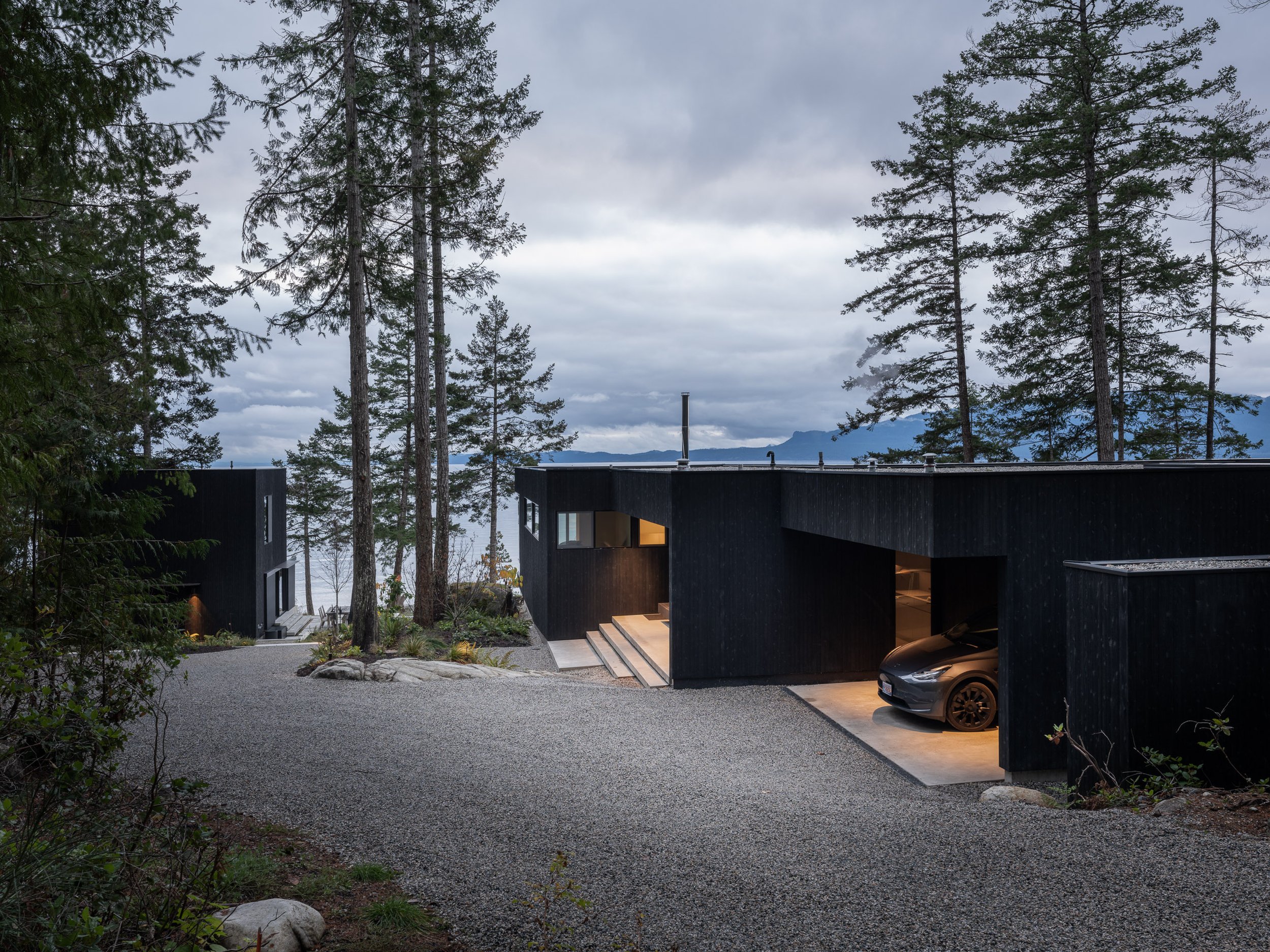 Aerial drone view showing alpine residence site strategy and mountain context