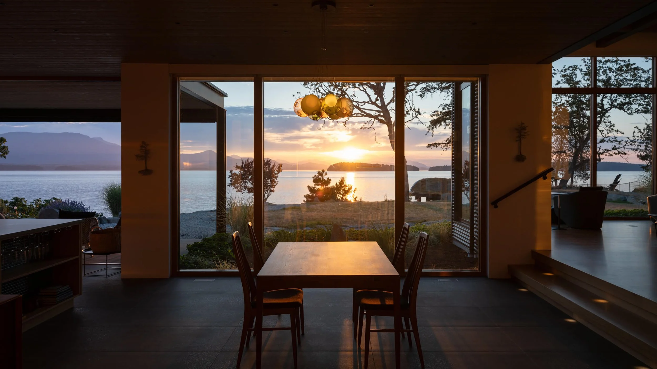 salt-spring-island-residence-dining-table-at-sunset-architectural-photographer-matt-anthony.jpg