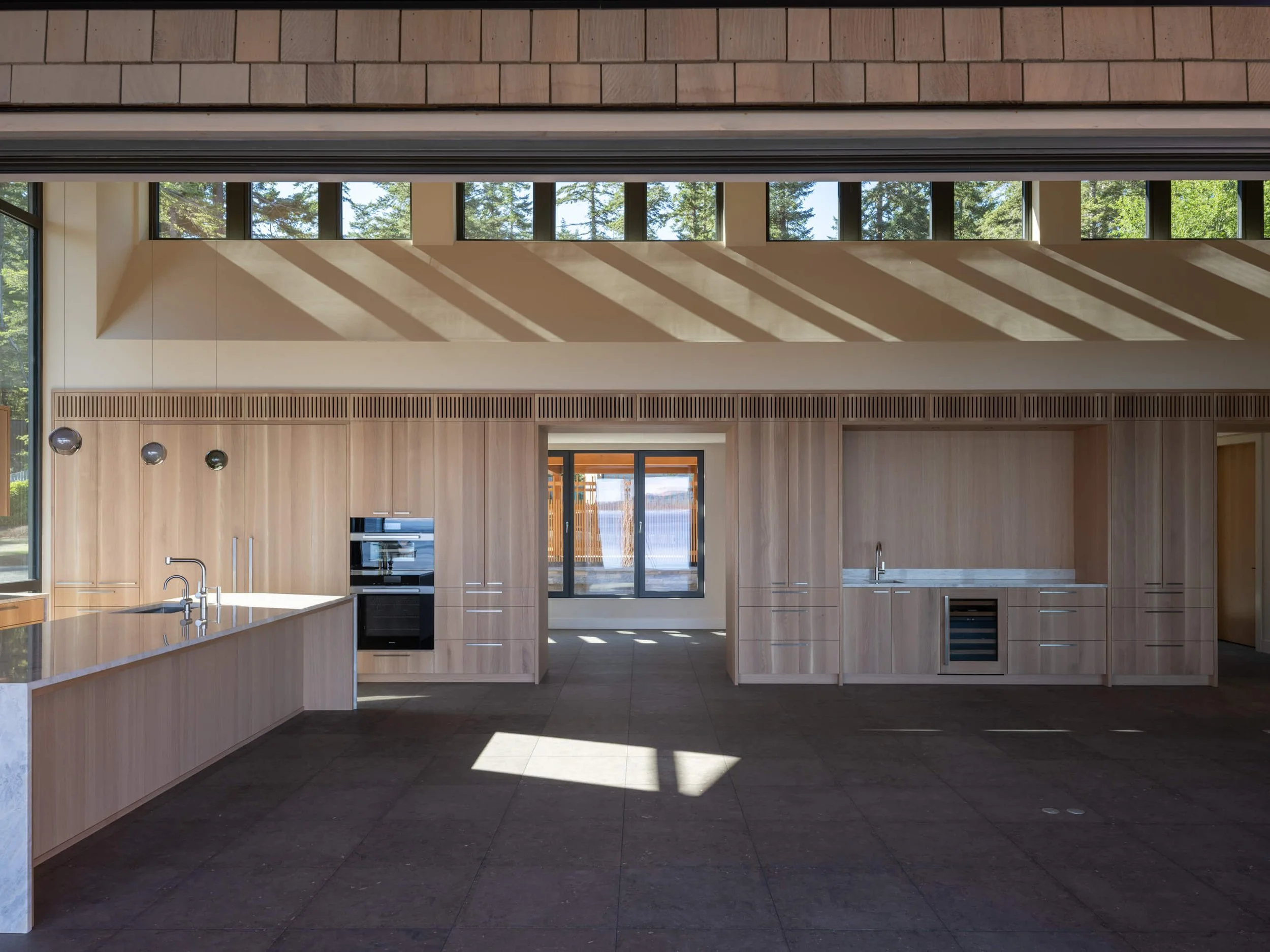 desolation-sound-residence-kitchen-cabinetry-wall-and-clerestory-architectural-photographer-matt-anthony.jpg