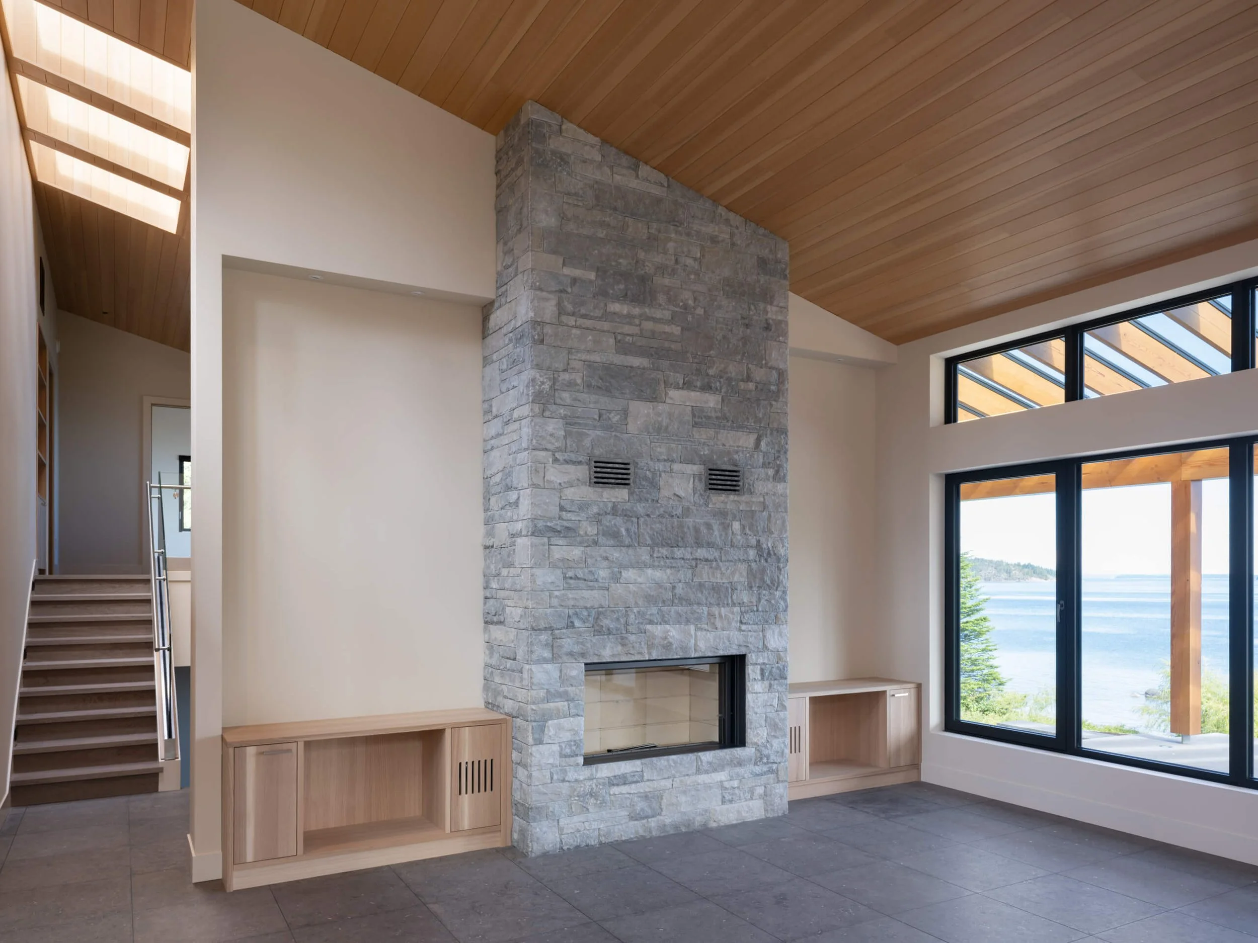 desolation-sound-residence-stone-fireplace-and-ocean-view-architectural-photographer-matt-anthony.jpg