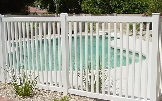 Select Series V202 vinyl picket fence enclosing backyard pool area in Morris County, NJ