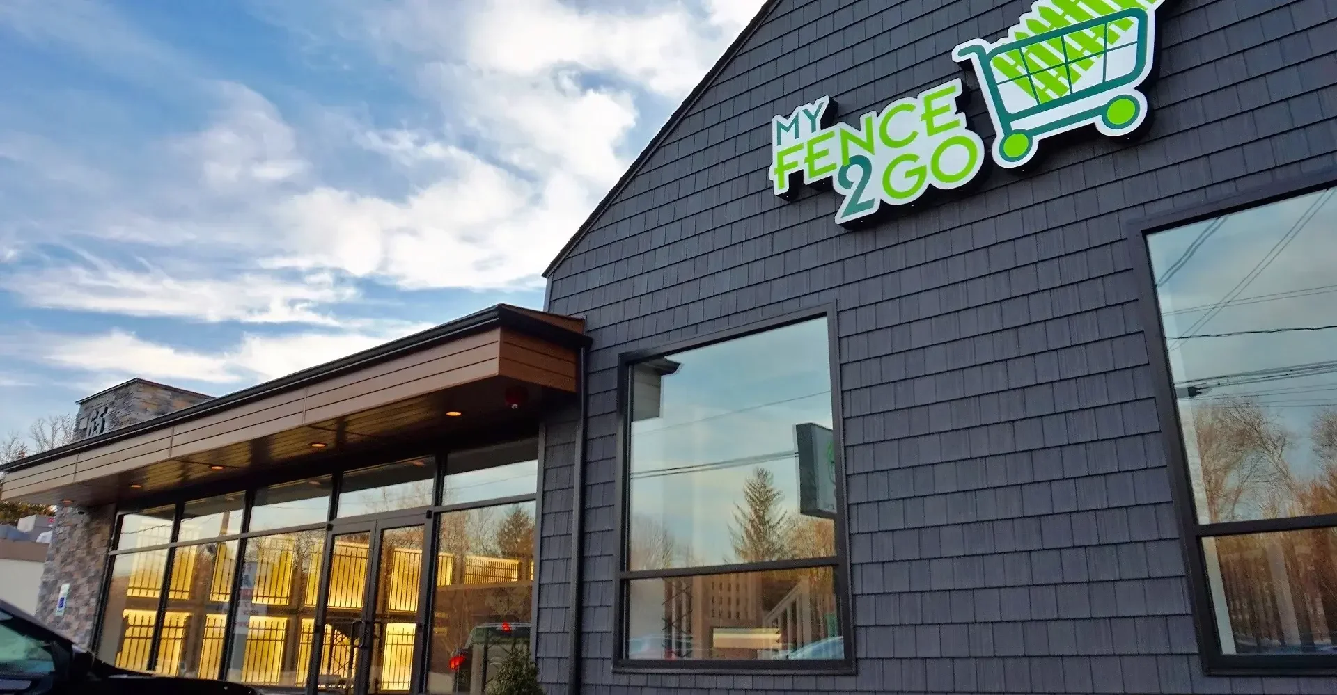 Deck with aluminum railing and MyFence2Go sign—fence store near me for contractors in Morris County, NJ