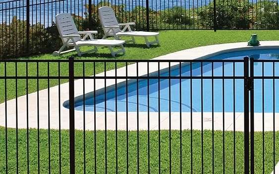 Select Series A202 Drop Rail aluminum fence surrounding a pool area in Morris County, NJ